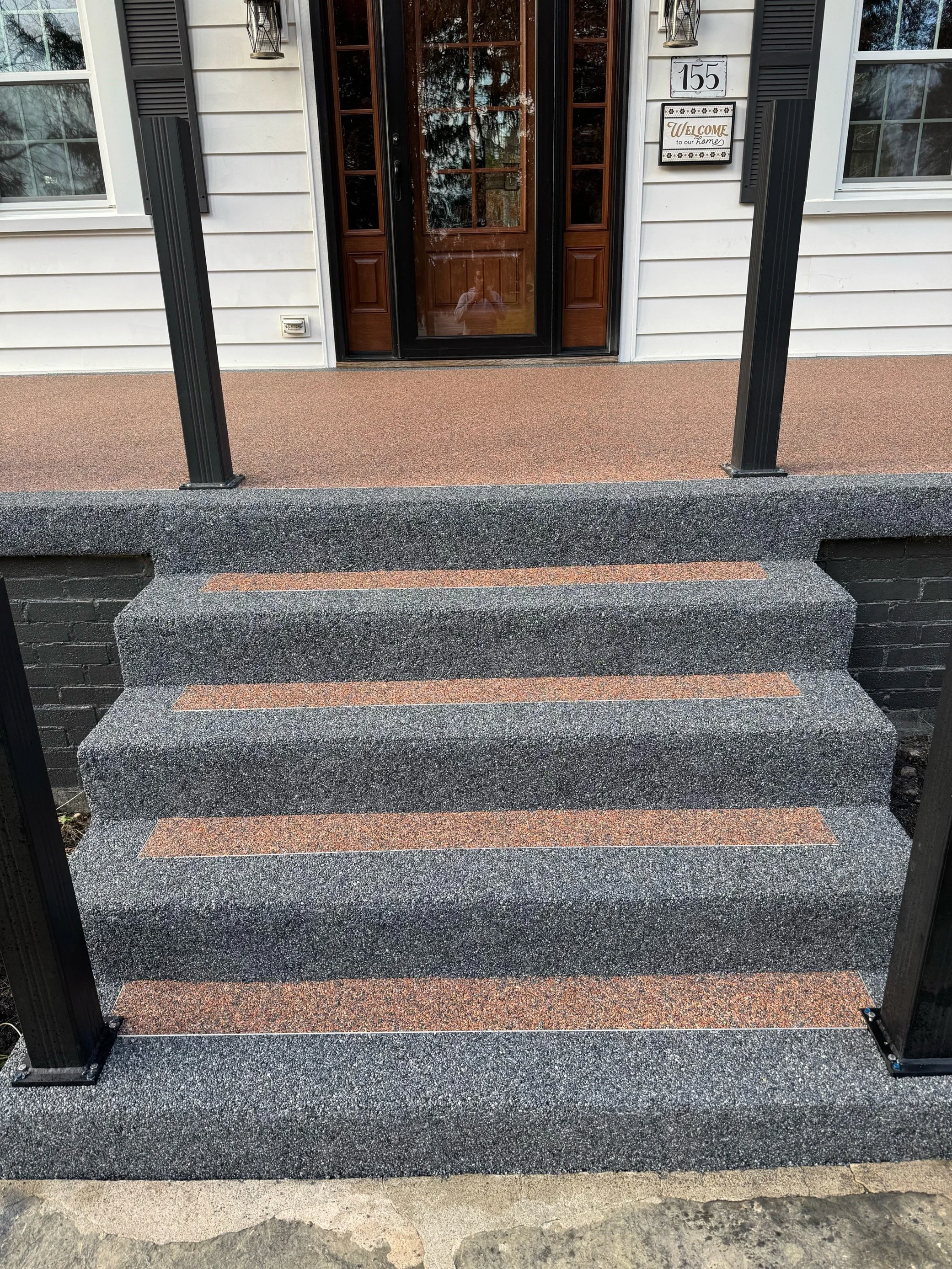 Stone steps installed over existing concrete at a residential home
