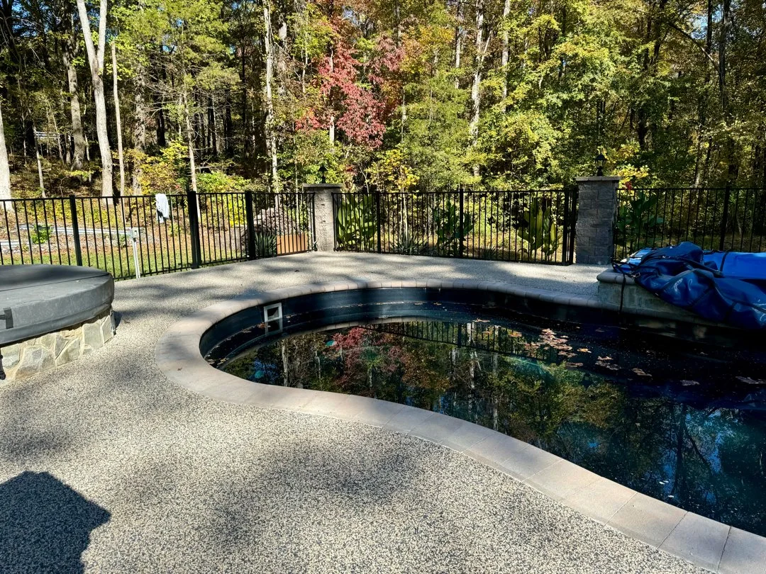 Finished pool deck resurfacing with natural stone surface