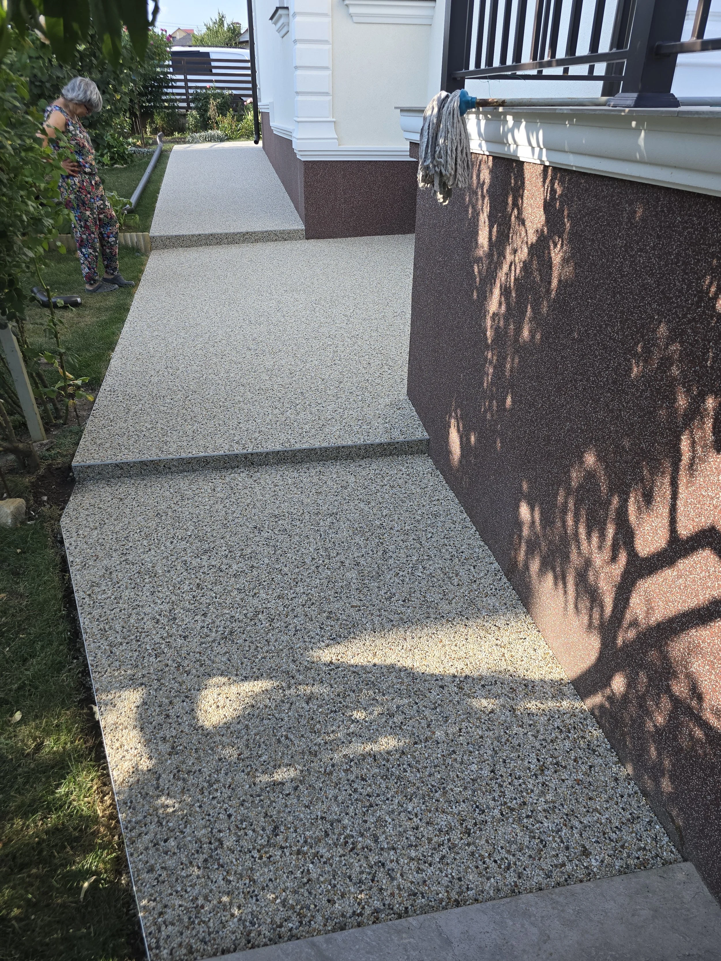 Exterior walkway and steps with durable stone finish