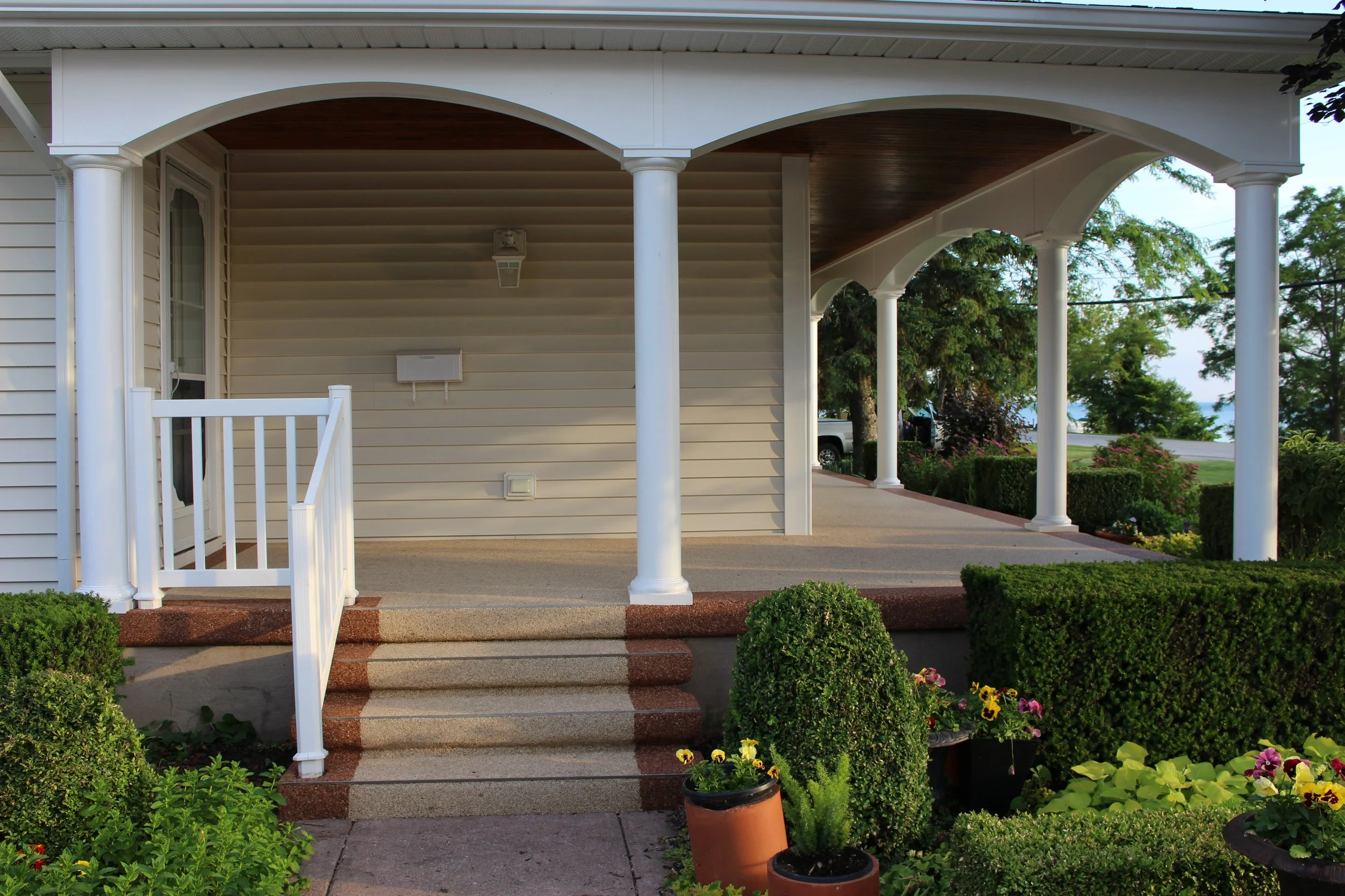 Durable stone porch and steps resurfacing after