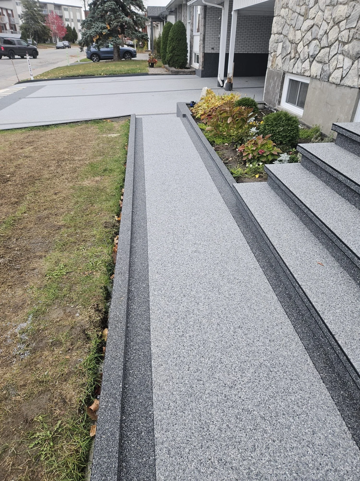 Exterior stone front steps installation at a residential property