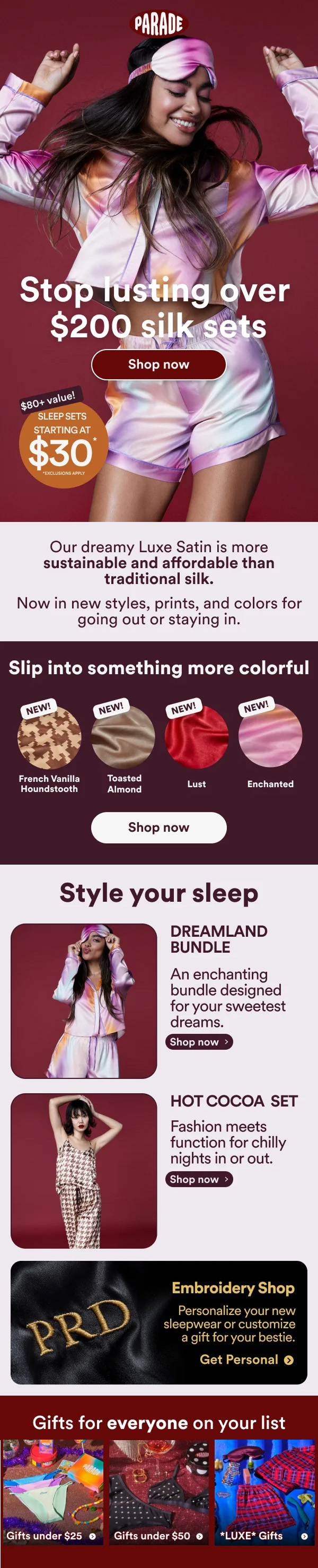 A woman wearing pink sleepwear and a sleep mask with the word "PARADE" on it, smiling with her arms raised, advertising silk sleep sets and sleepwear styles.