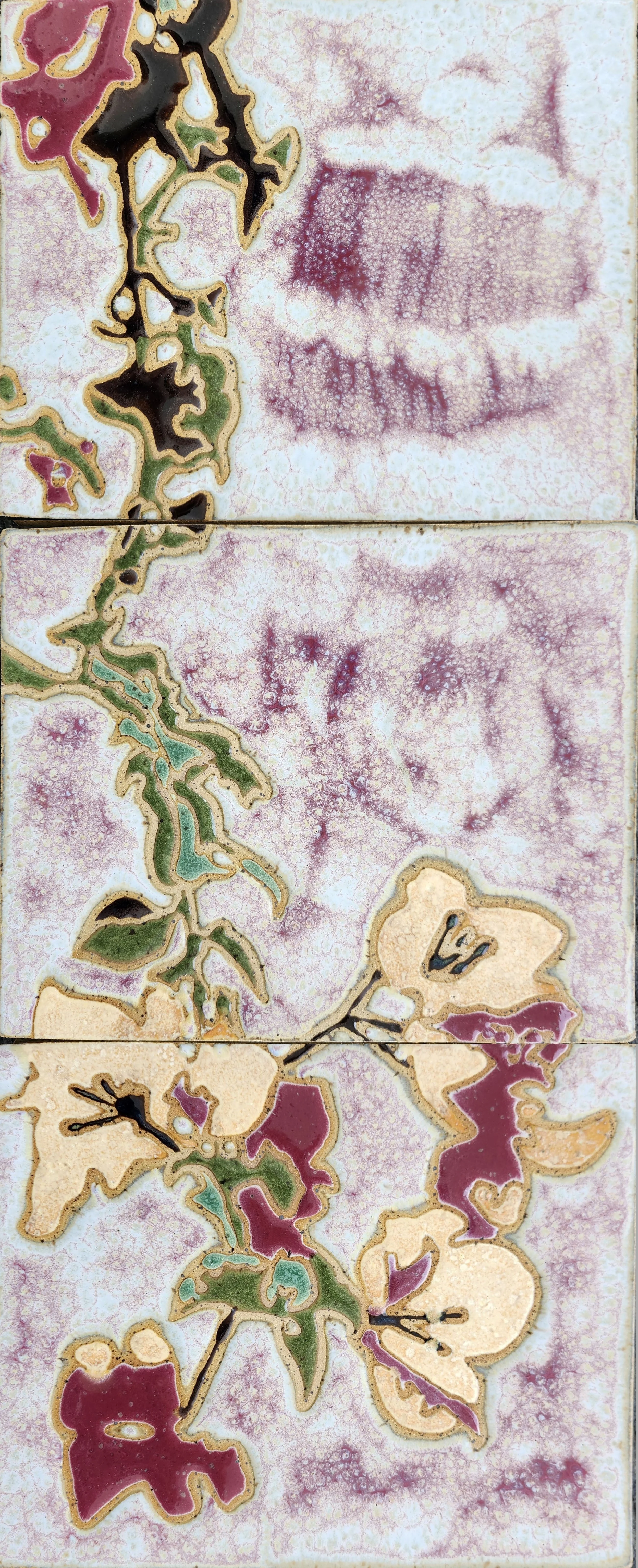 Ceramic tile mural of a bougainvillea plant.