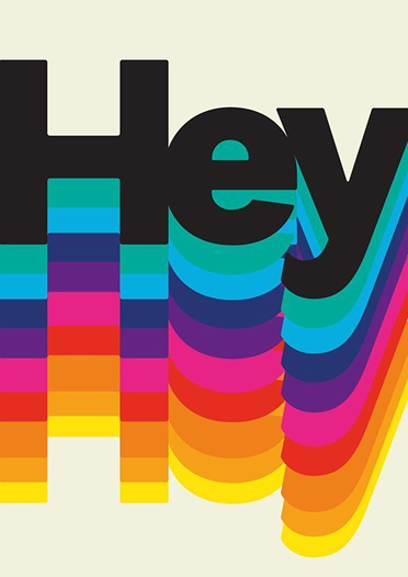 Colorful rainbow pattern forming the partial word 'Hey' in bold letters with a retro, vibrant design.