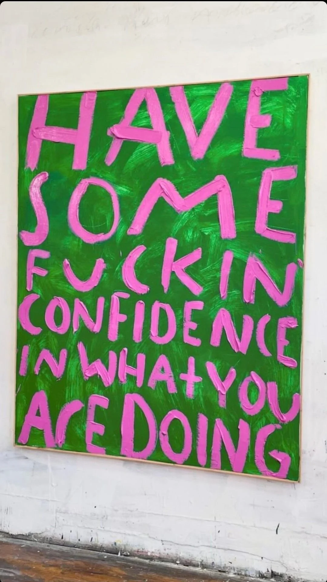 Colorful poster with pink hand-painted letters on a green background that reads, "HAVE SOME FUCKIN CONFIDENCE IN WHAT YOU ARE DOING."