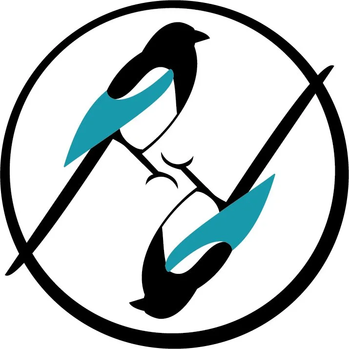 A circular sign with a black and white illustration of two hands holding a small bird, with the bird's wings in teal. 90 degrees rotated from each other. The sign indicates no handling or disturbing birds.