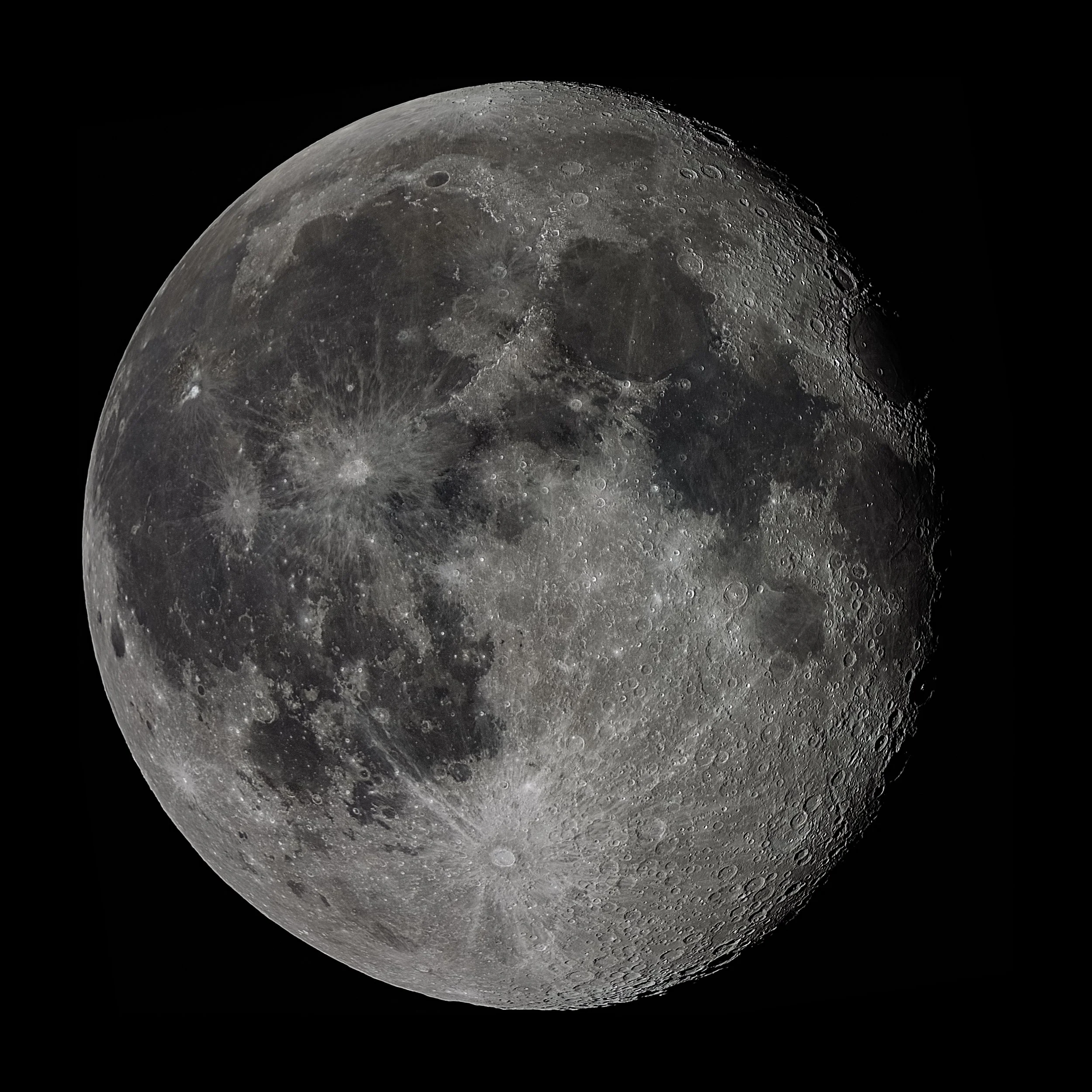 Close-up of the full moon showing detailed craters and lunar surface features against the black space background.