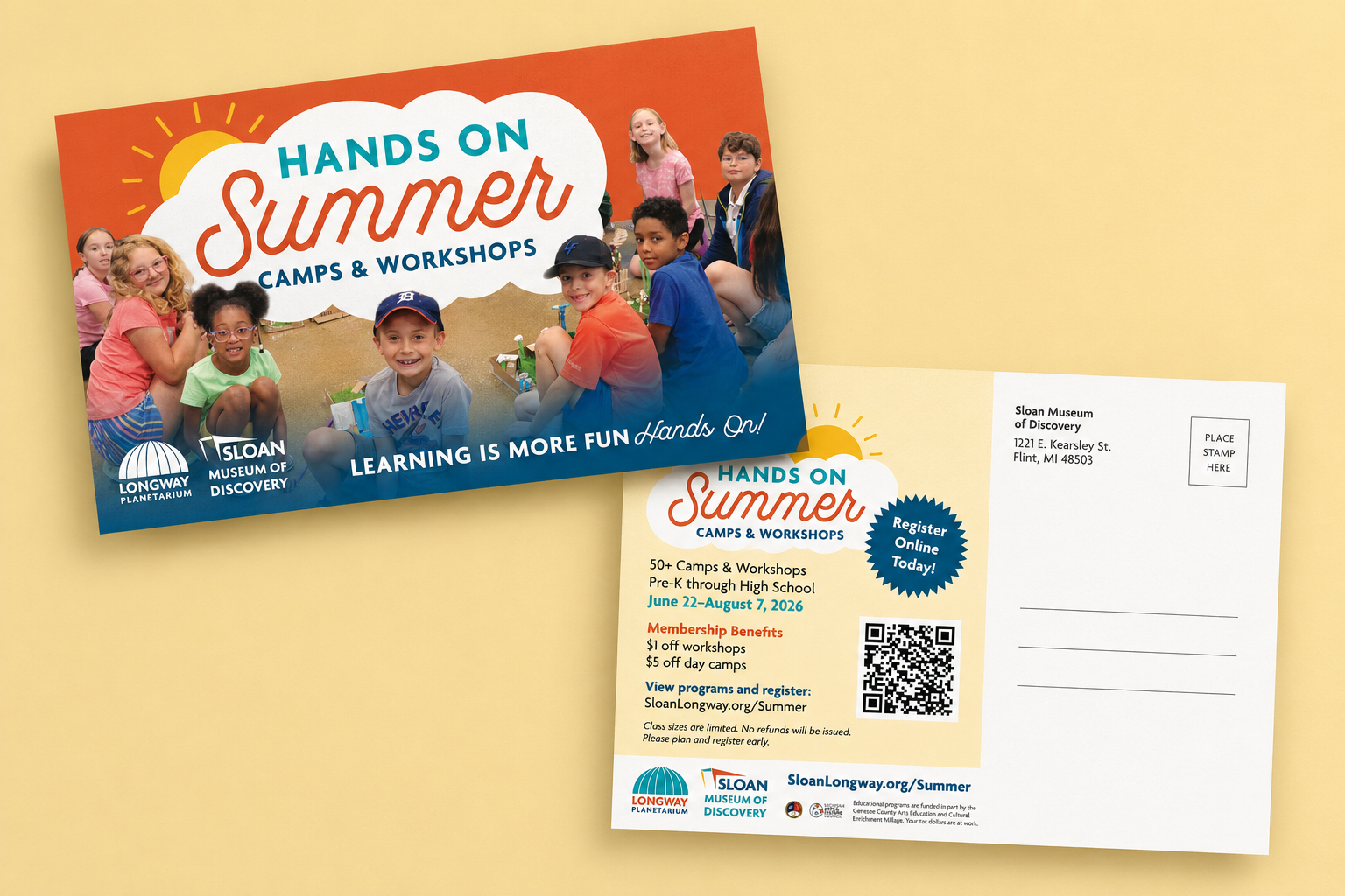 A colorful postcard promoting summer camps and workshops at Sloan Museum and Longway Planetarium featuring a group of smiling children with a sunny sky and clouds in the background, and includes camp dates and registration information.