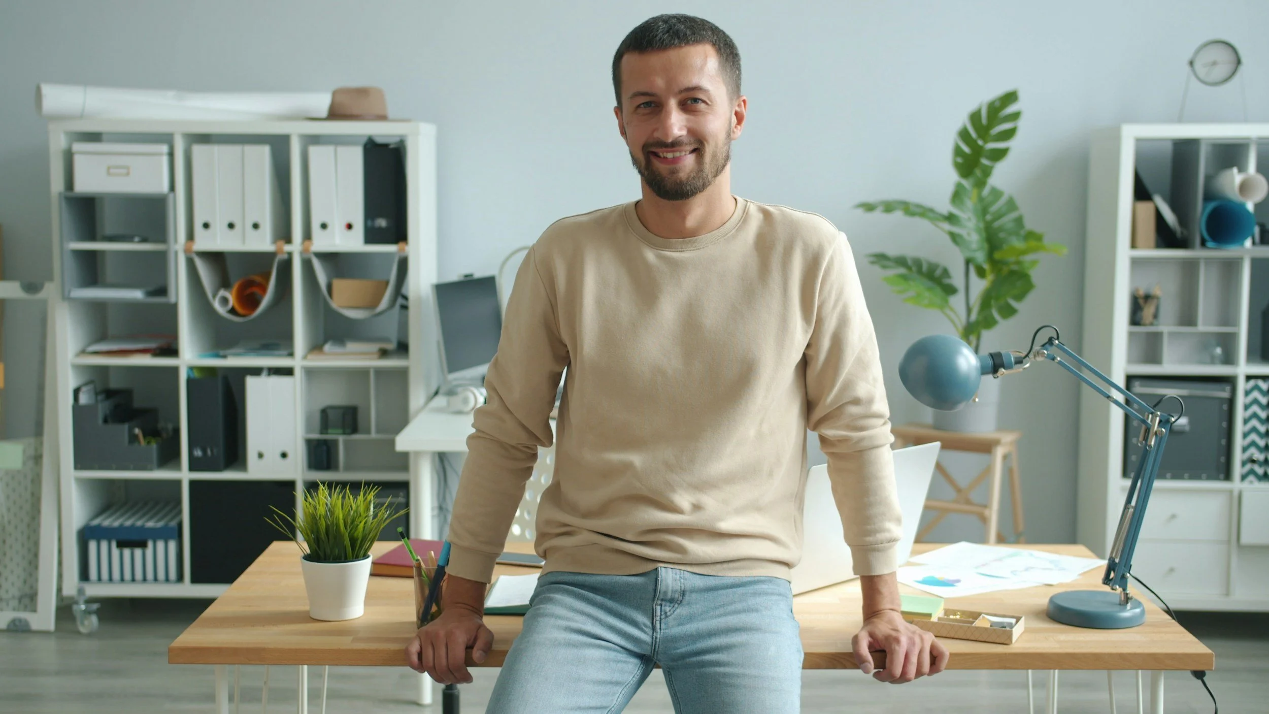 Professional man working at a desk in a bright office