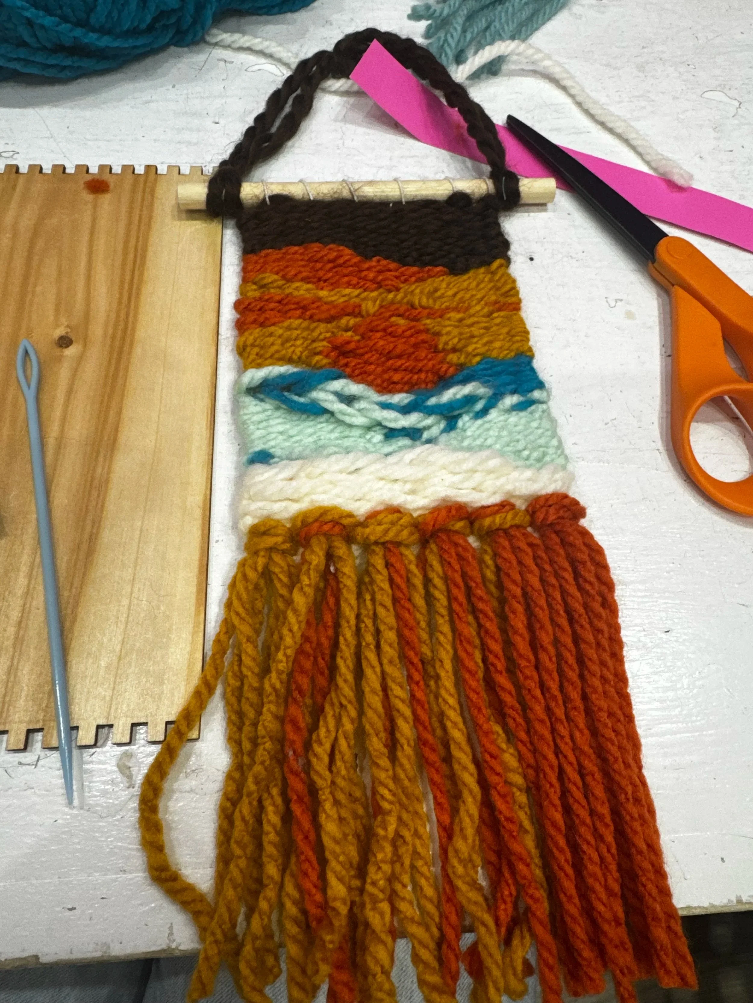 My first time with notched loom weaving.