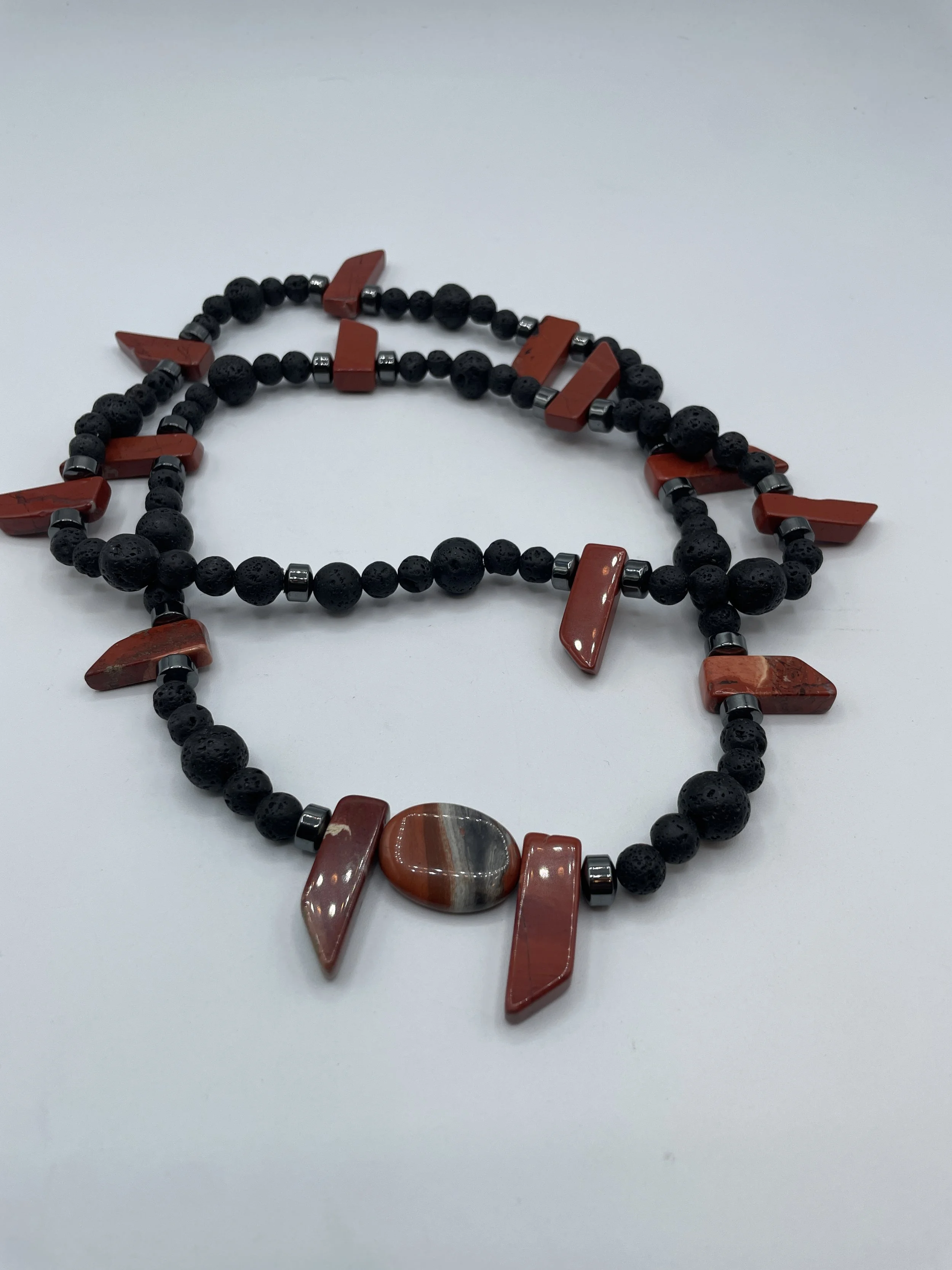 Kiongozi Stone Necklace
•	Mens Collection
•	Launches August 9th, 2026
