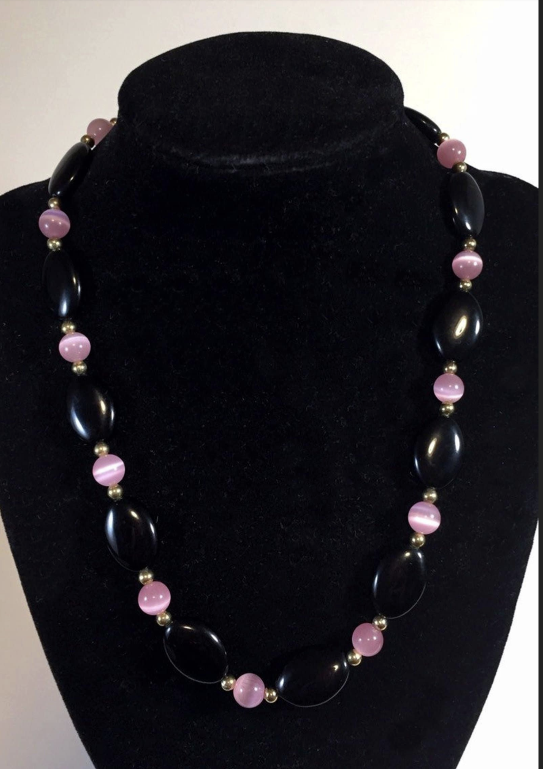 Midnight rose eye necklace.png