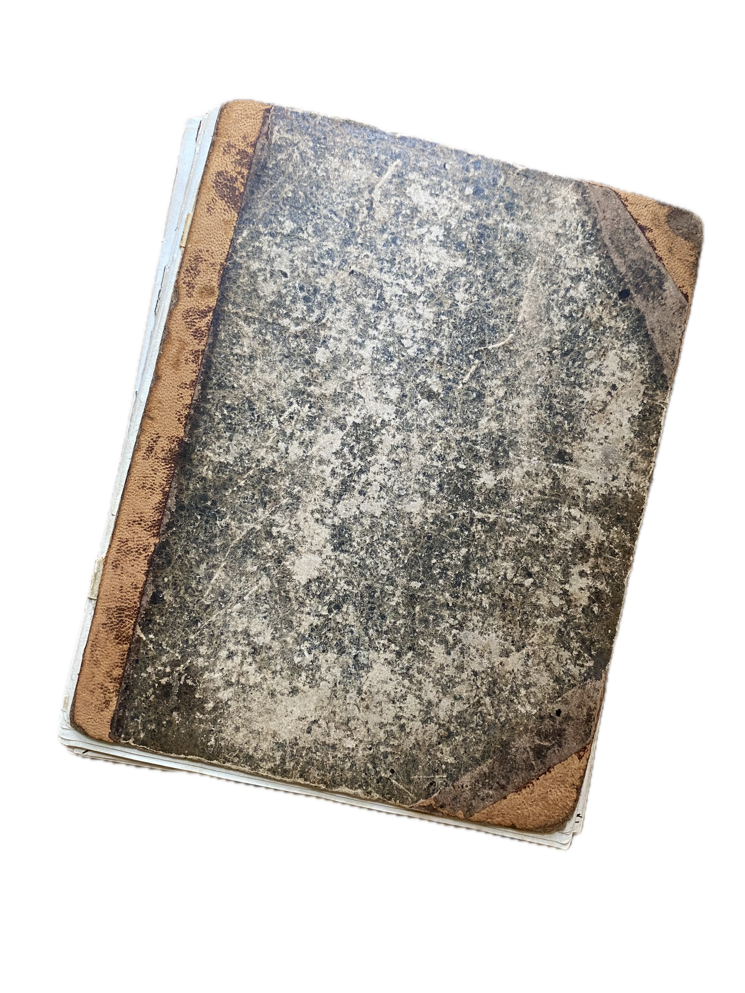 An old, worn-out book with a dark, speckled cover and a brown leather spine.