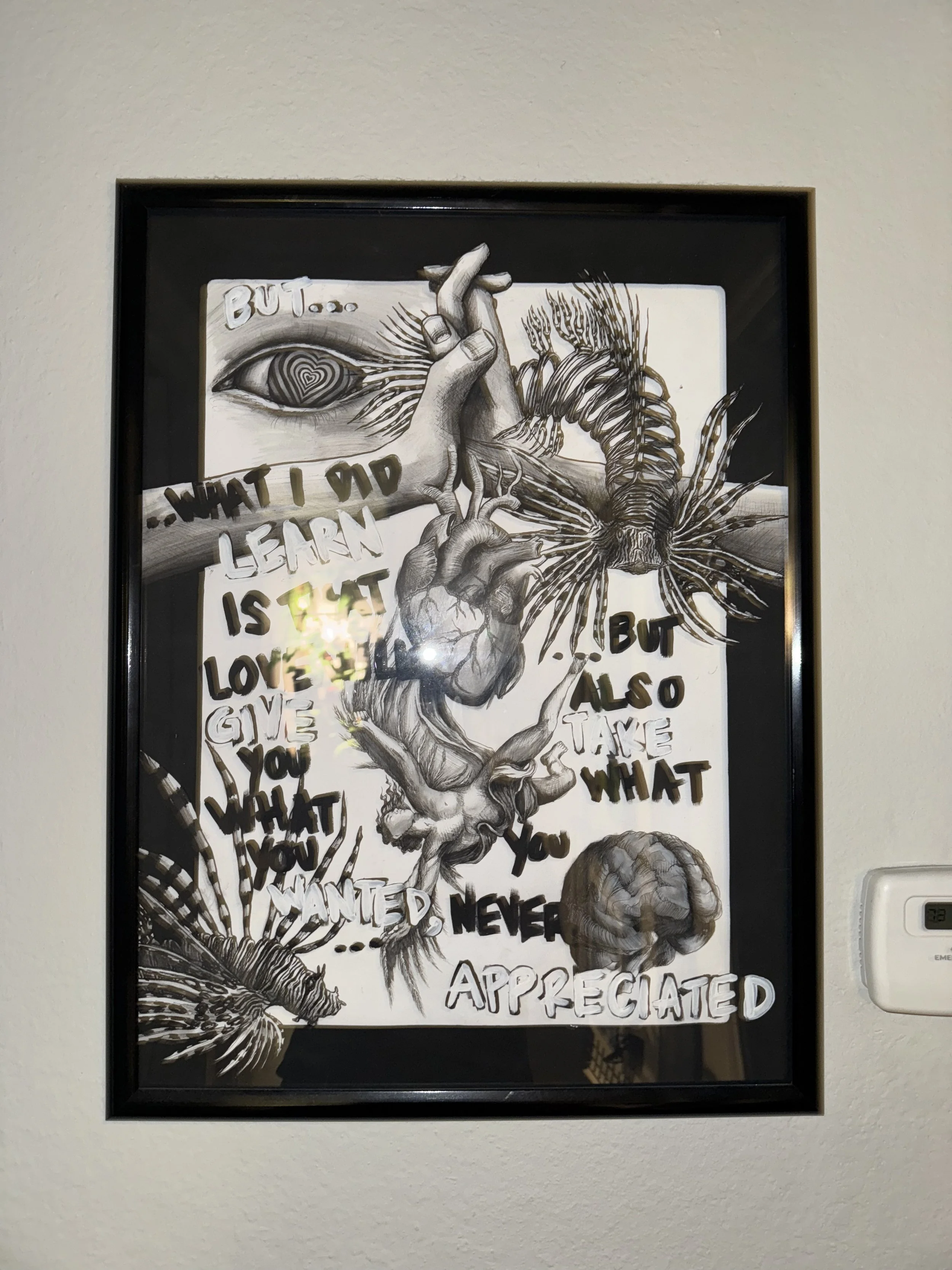 Black and white framed artwork titled 'But...'. Features a detailed drawing of a human heart, several insects, a praying hand, and an eye with a spiral pattern. Contains handwritten-style text reading 'What I did learn is that love is... but also tak