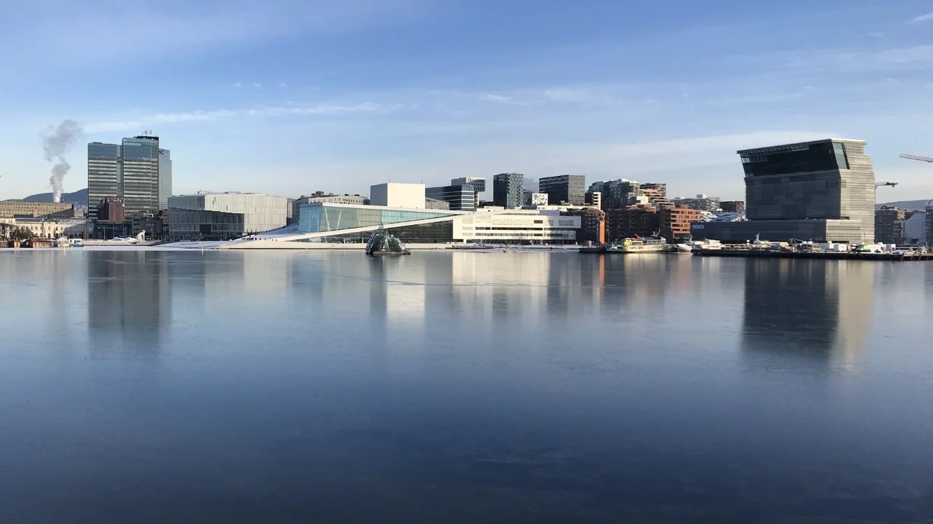 Oslo city skyline and waterfront reflected in the Oslo Fjord