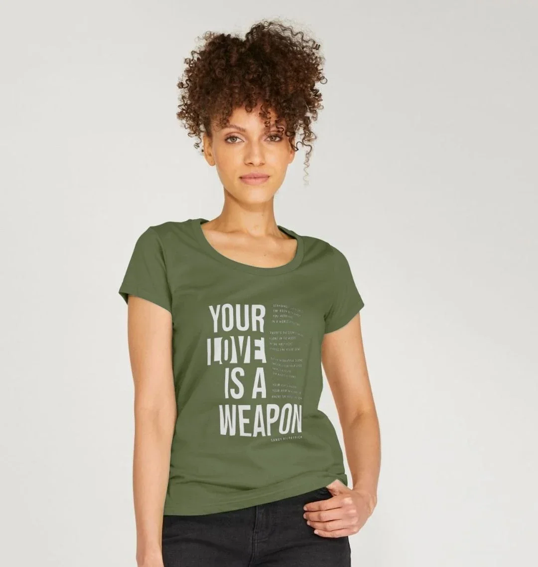 odel wearing Your Love Is A Weapon t-shirt by Sandy Kilpatrick