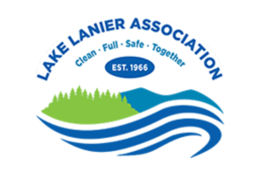Logo for Lake Lanier Association featuring a green tree and blue waves, with the words 'Lake Lanier Association,' 'EST. 1966,' and the slogans 'Clean, Fun, Safe, Together'.