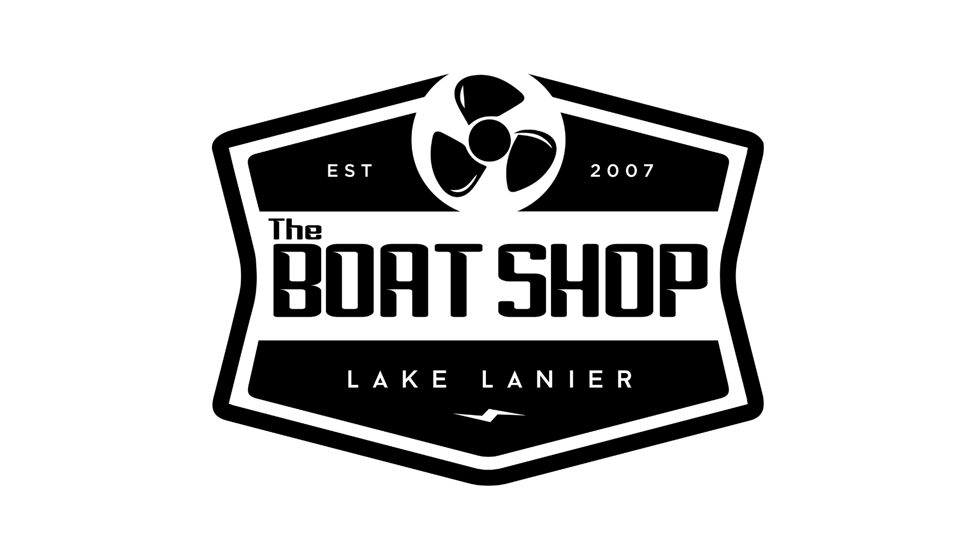 Black and white logo for the The Boat Shop at Lake Lanier, established in 2007, featuring a stylized boat propeller at the top.