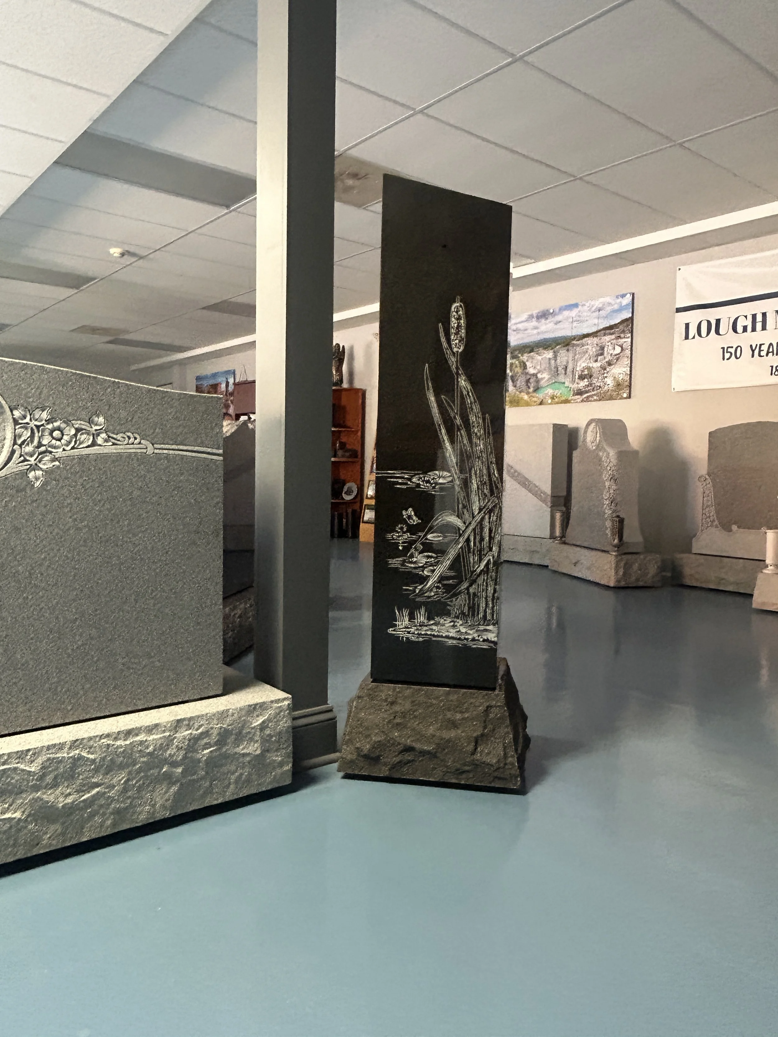 the inside of the Lough Memorials showroom with in-stock gravestones