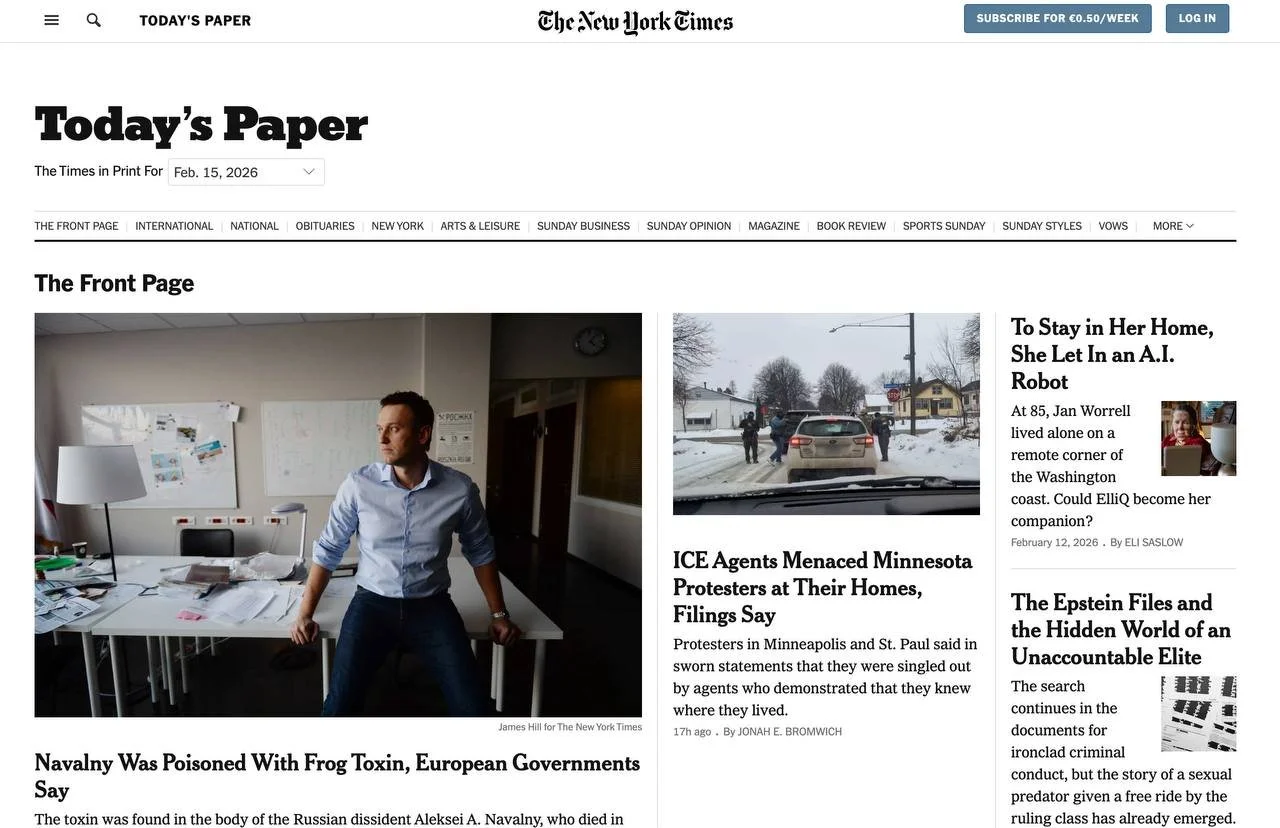 Screenshot of The New York Times homepage from February 15, 2026, showing various news articles and images, including a man in a blue shirt standing in a cluttered office, a snowy street scene, and other news headlines.