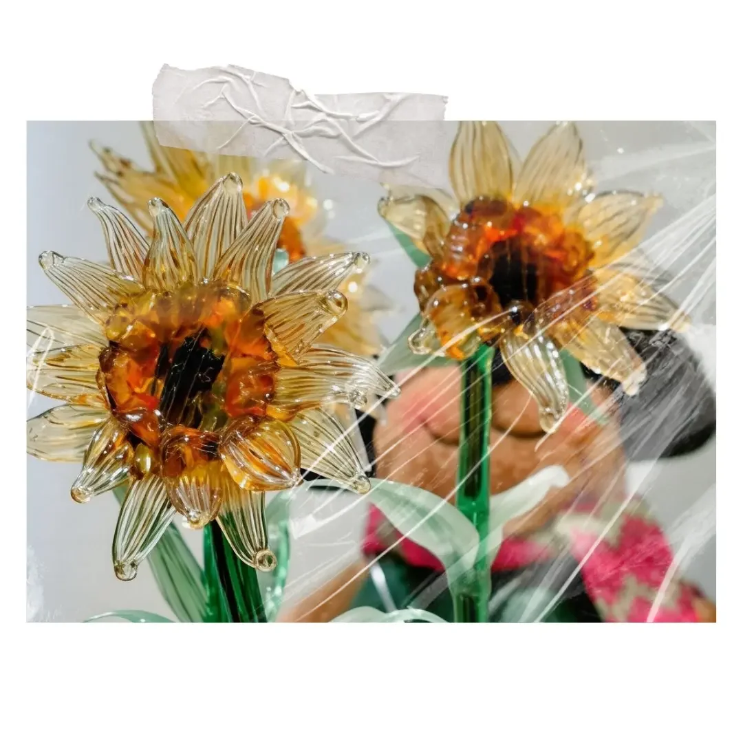 Two sunflowers made from glass.