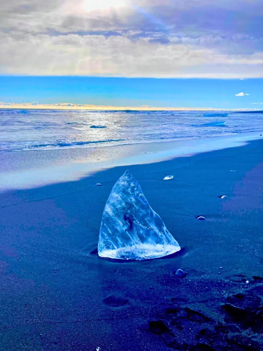 Copyright Knot Waste: Diamond Beach, Southern Iceland -  Across The Road from The Lagoon, Bright-Blue And White Icebergs Wash up onto The Black Volcanic Sand.
