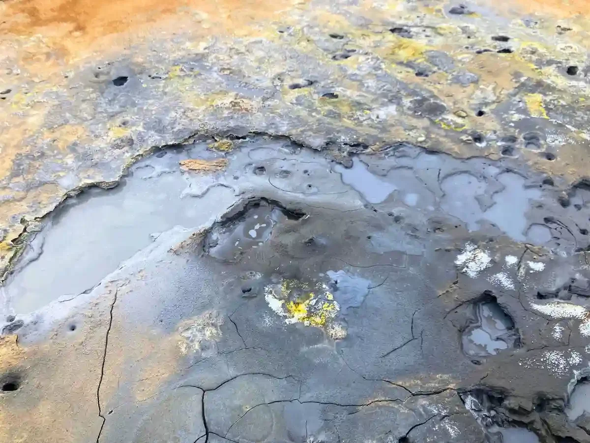 Copyright Knot Waste: Akureyi Trip, Iceland: Acidic steam and gases mix with surface water and weathered rock to form a thick, sticky pool of mud.