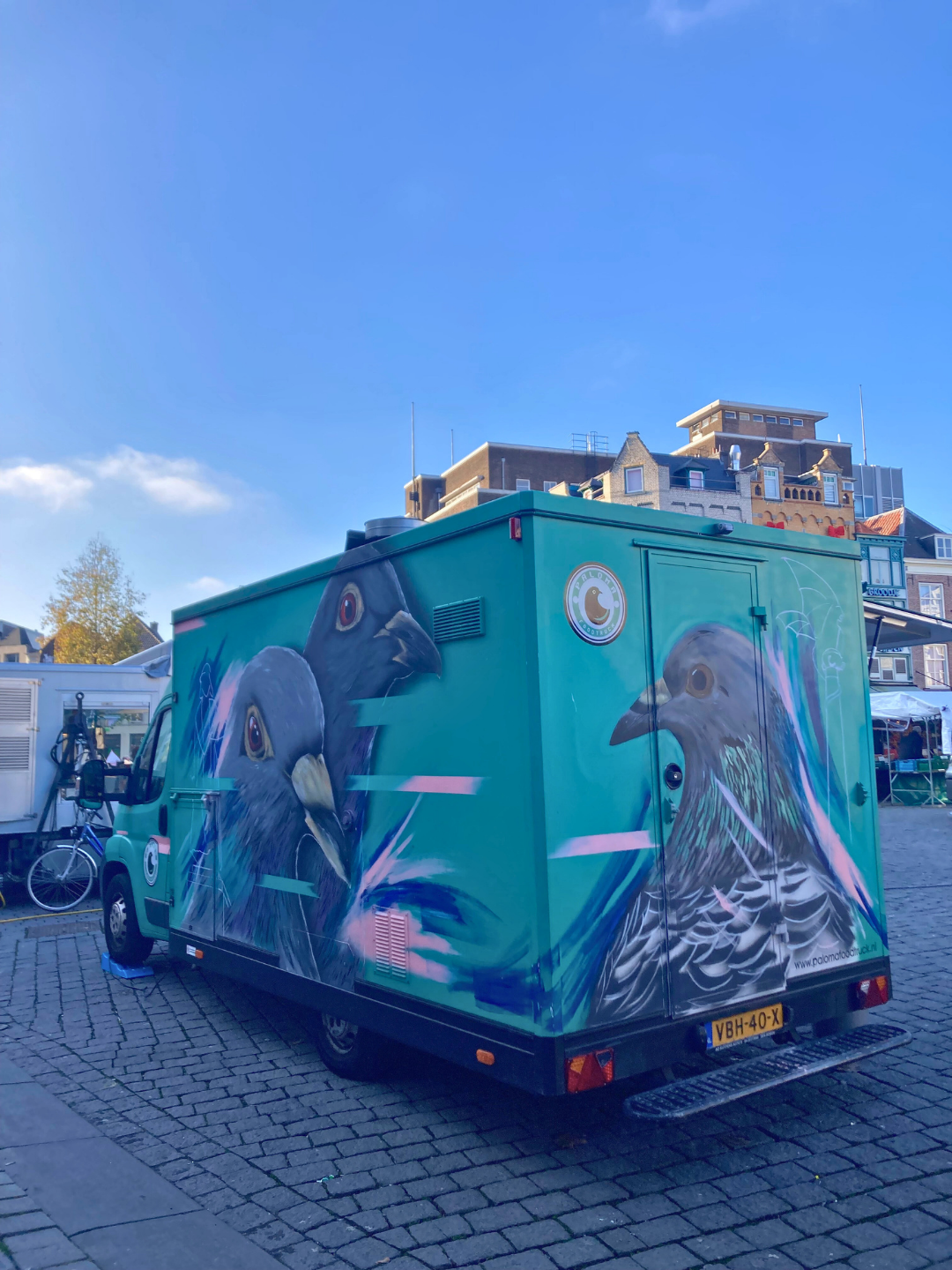 Art as Nature Connection - den - bosch - netherlands - pigeon - mural - on - truck .png