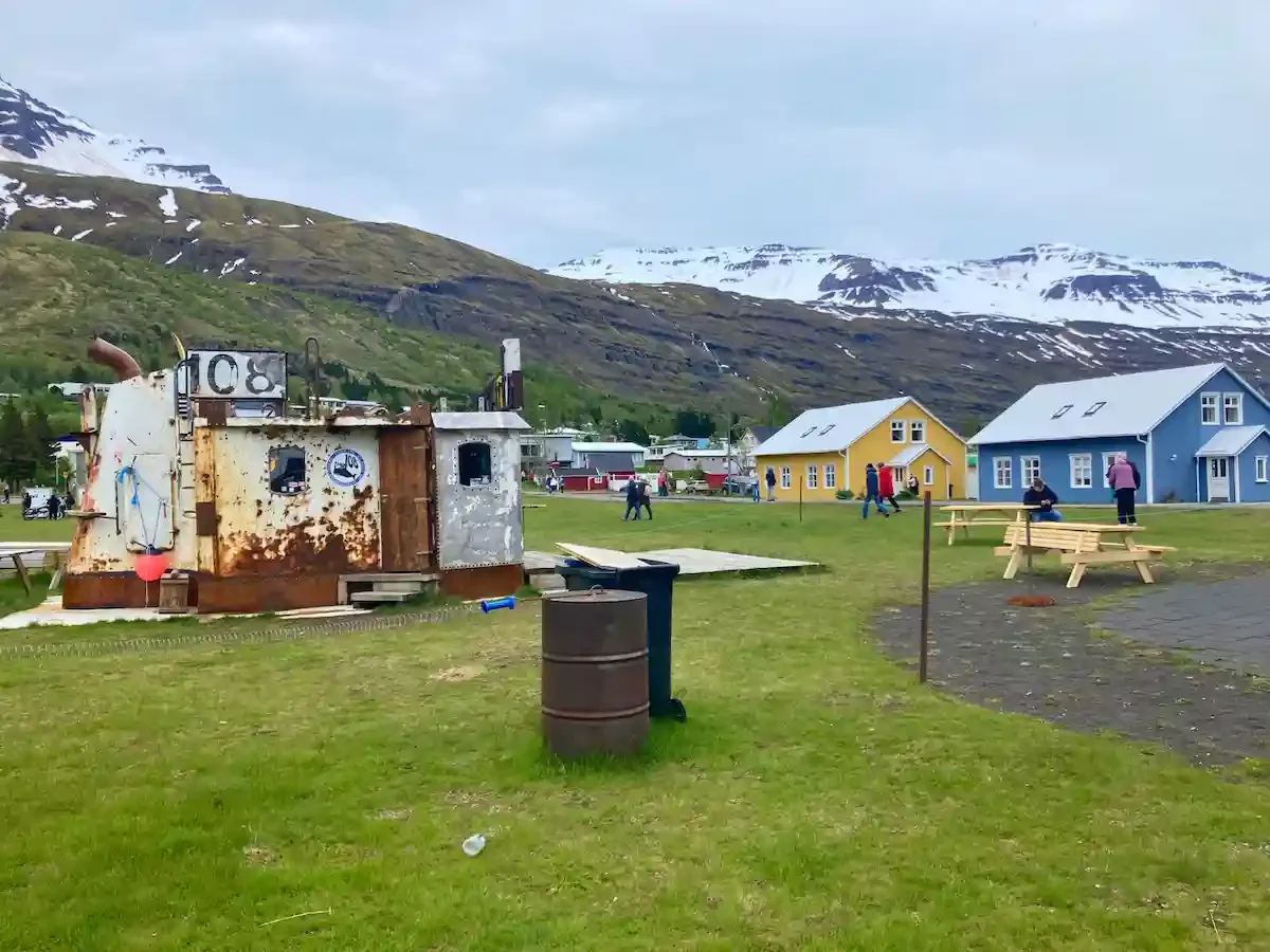 Copyright Knot Waste: Seyðisfjörður, Iceland - Towards the port is a hub of reclaimed structures, repurposed as shops, cafes, and galleries.
