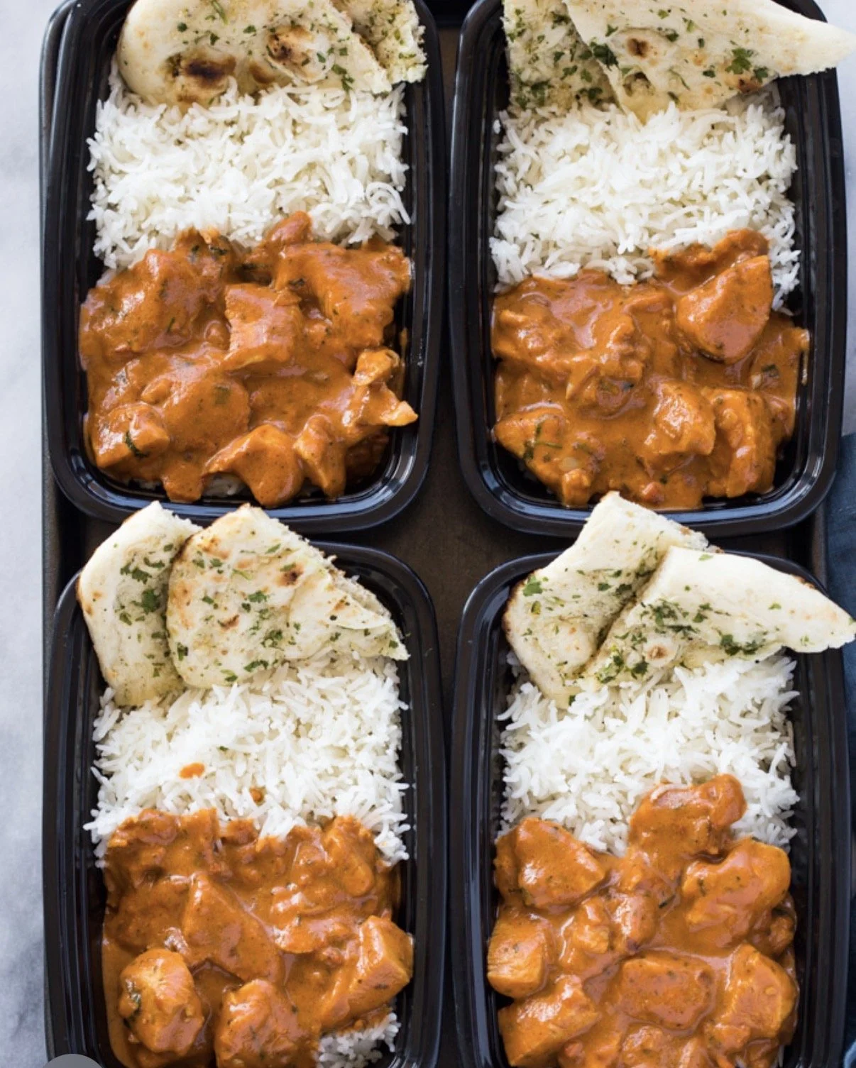 Indian Butter Chicken with White Rice and Garlic Nan Nan Bread