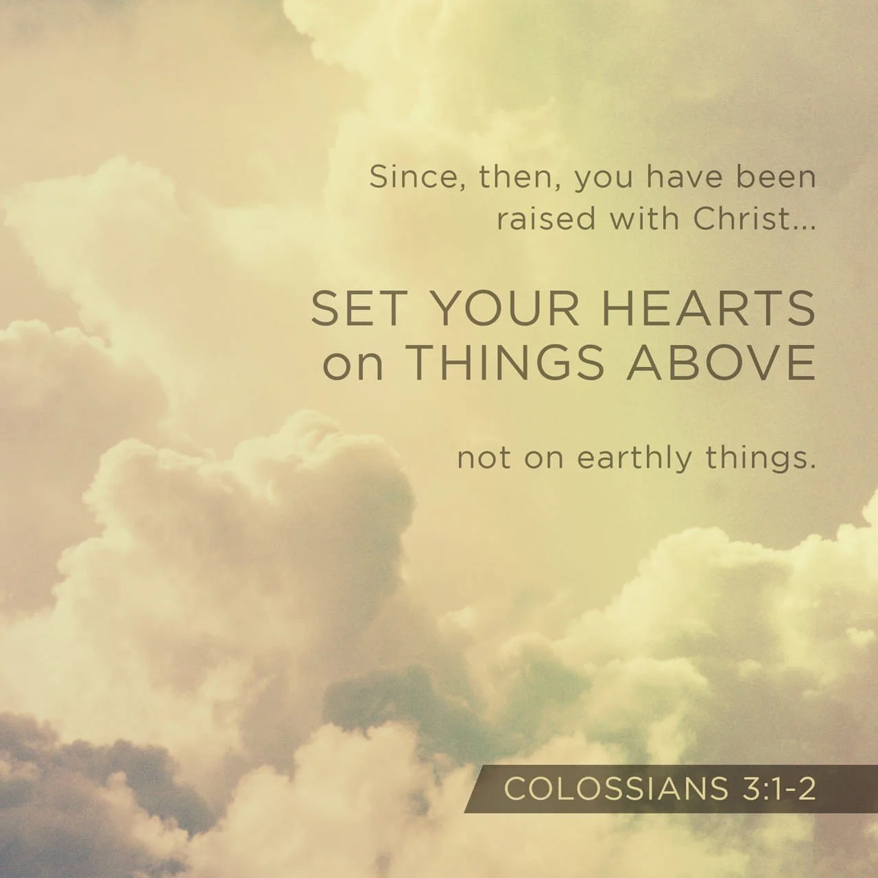 A quote from Colossians 3:1-2 over a backdrop of a cloudy sky with sunlight filtering through.