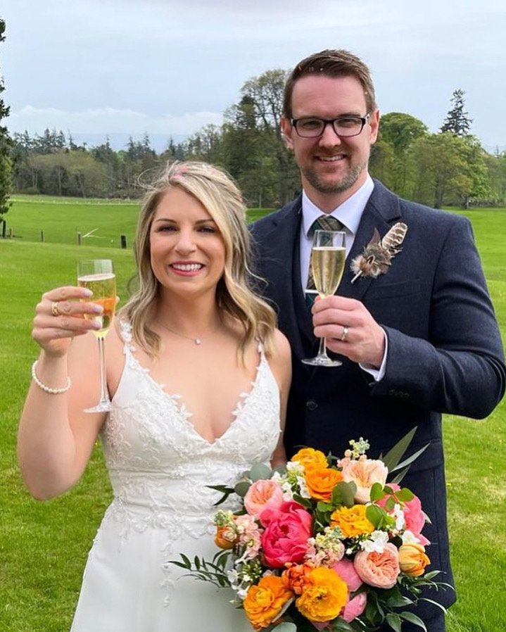 Outdoor countryside wedding portrait with soft glam bridal makeup by Elisa Flowers, natural glowing skin