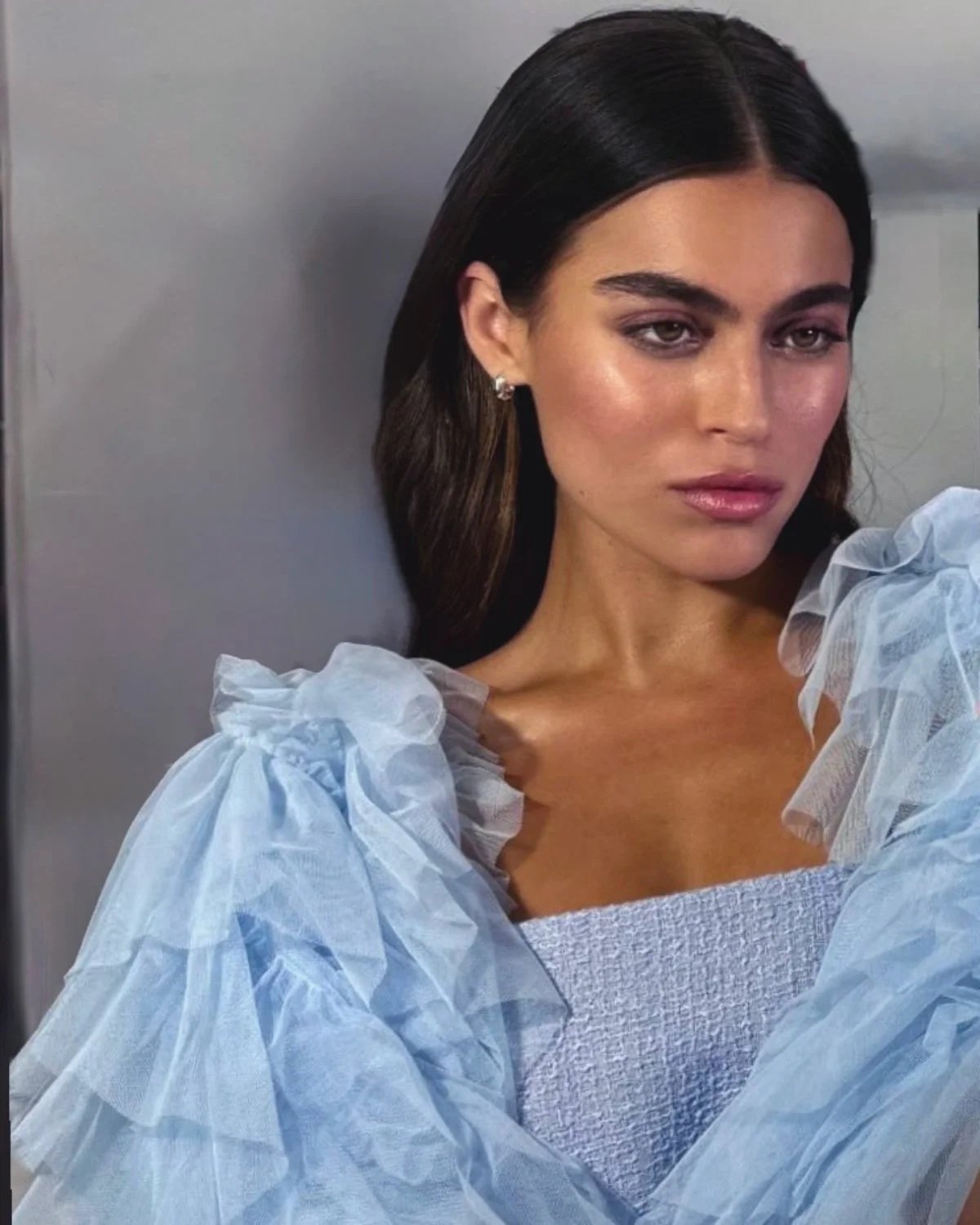 Modern bridal makeup with luminous skin, soft sculpted contour and glossy neutral lip by Elisa Flowers NYC