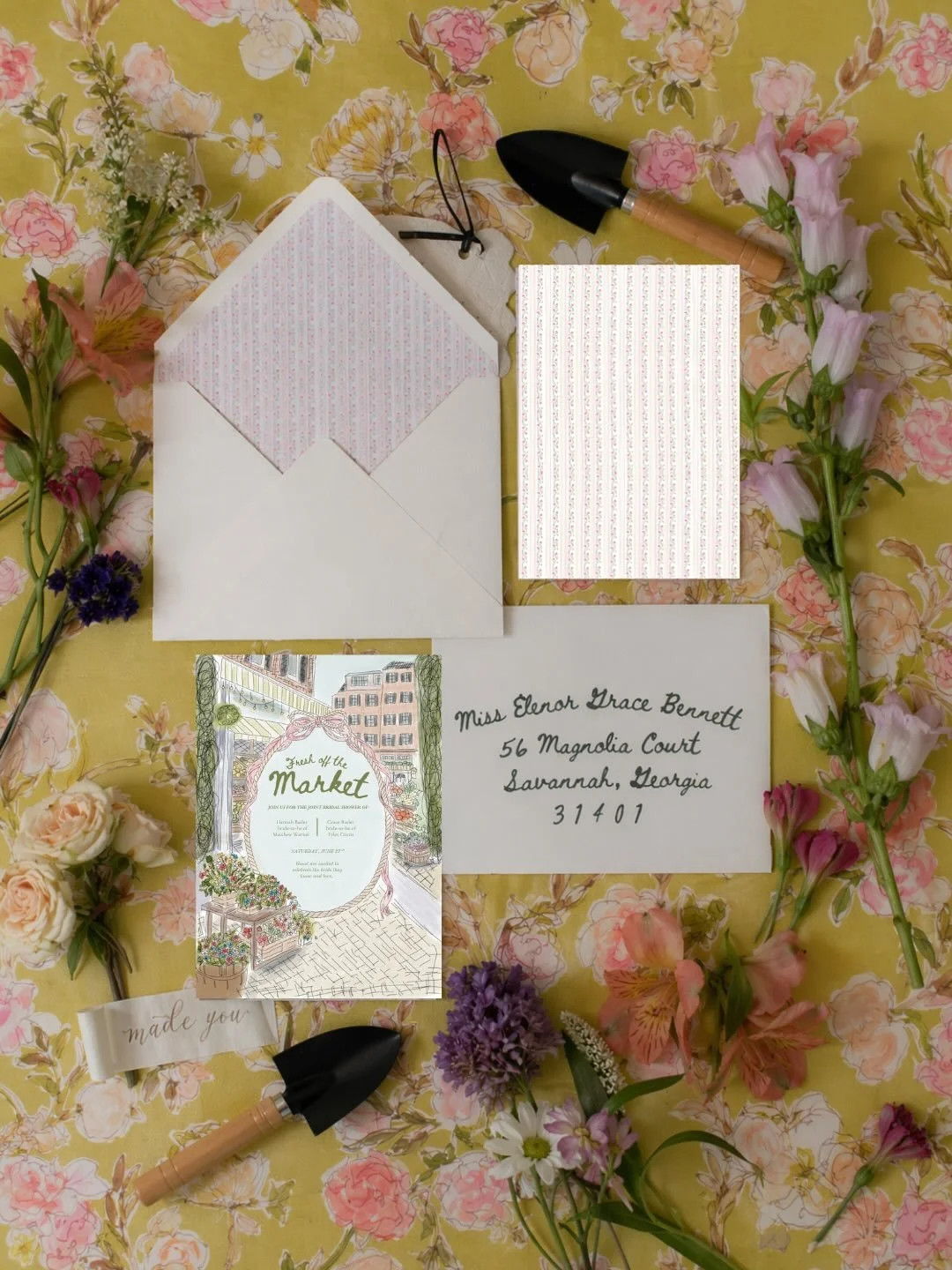 A custom bridal shower invitation suite designed to feel playful, feminine, and full of charm.

This bespoke stationery collection was created with hand-drawn artwork, a custom illustrated invitation, patterned envelope liner, handwritten envelope ad