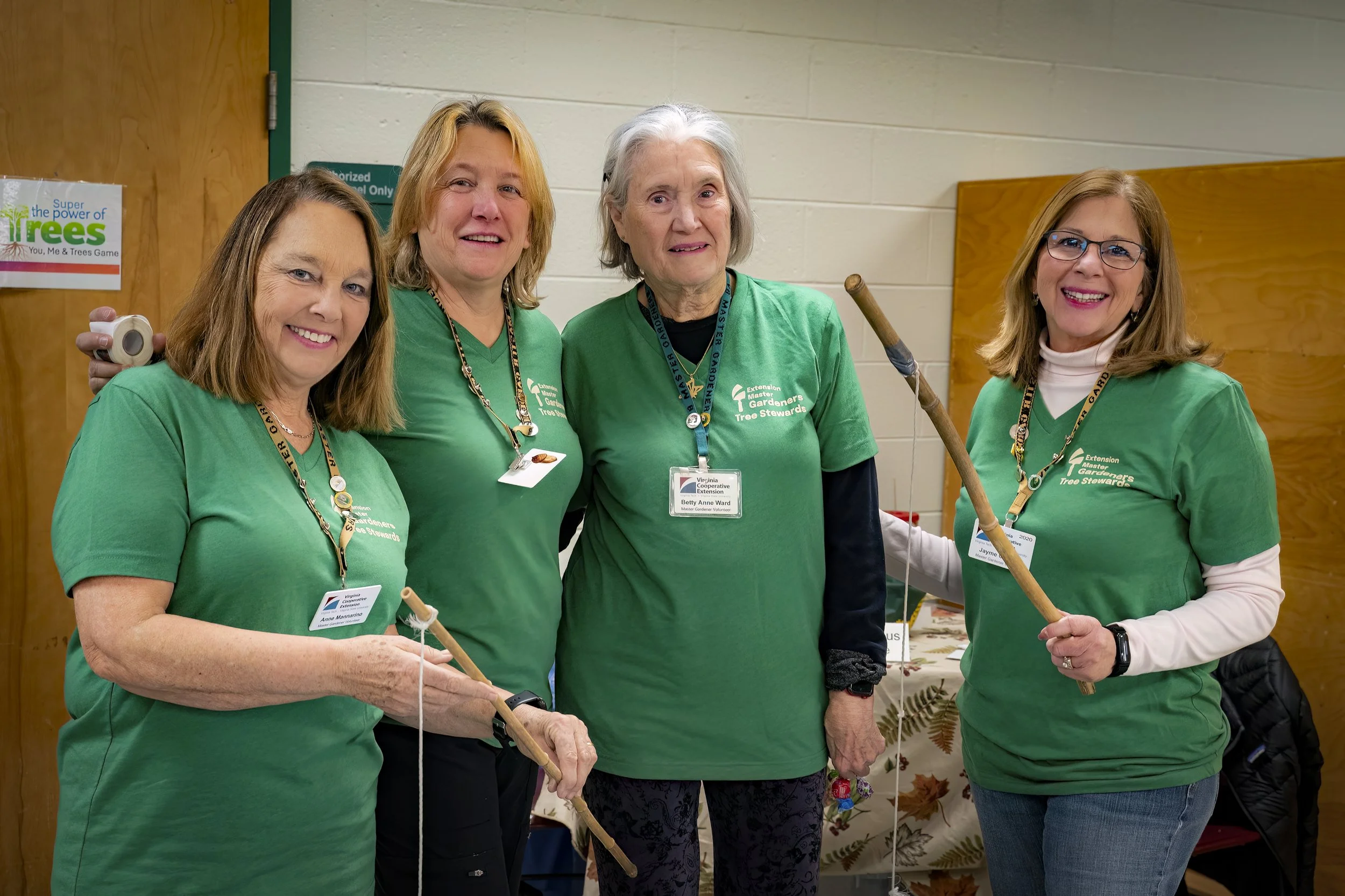 Four Master Gardeners at an indoor project