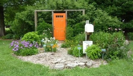 Orange door in Bayscape garden