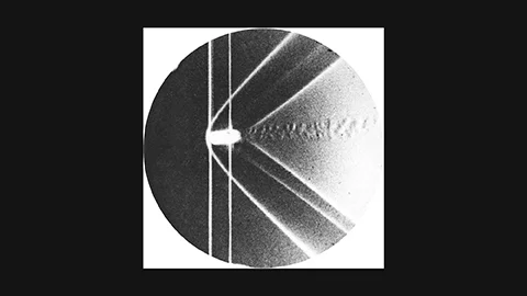 Ernst Mach 1887: shadowgraph of supersonic brass bullet revealing shock waves – first high-speed scientific photography
