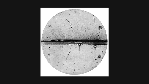 Anderson 1932: curved particle track in cloud chamber vapor – first photographic proof of the positron
