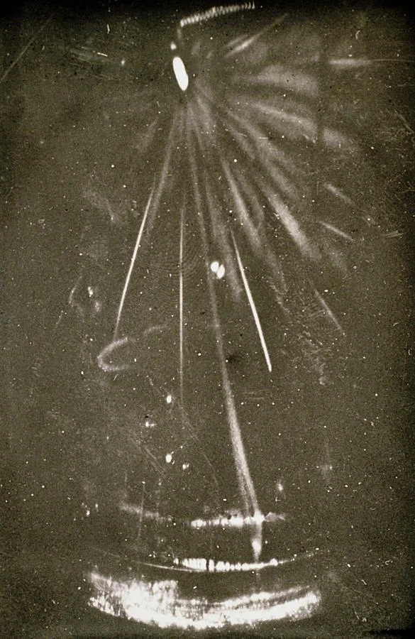 C. T. R. Wilson, 1927: one of the first cloud chamber photographs — particle tracks captured by the technique that earned Wilson the Nobel Prize.