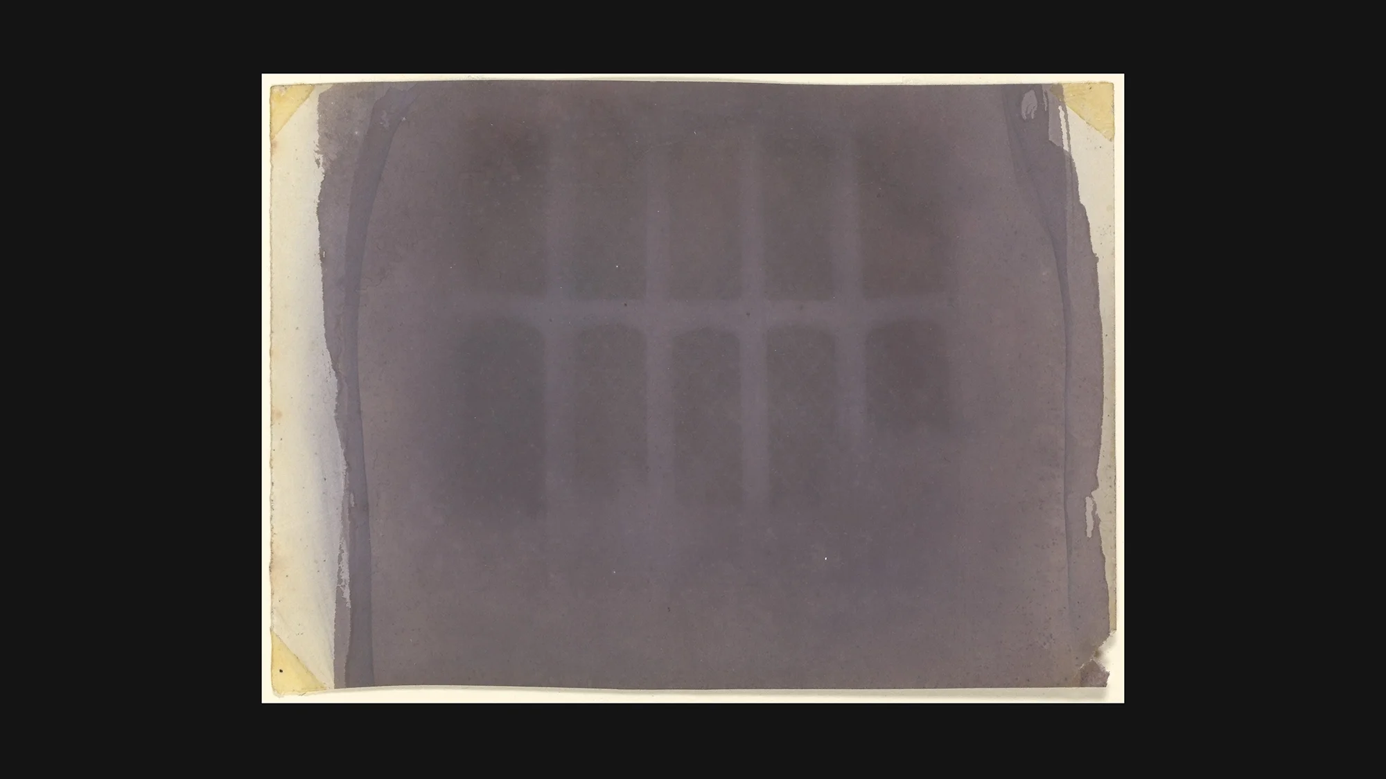 Talbot 1835: paper negative of Lacock Abbey's oriel window, tonally reversed – first reproducible photographic negative