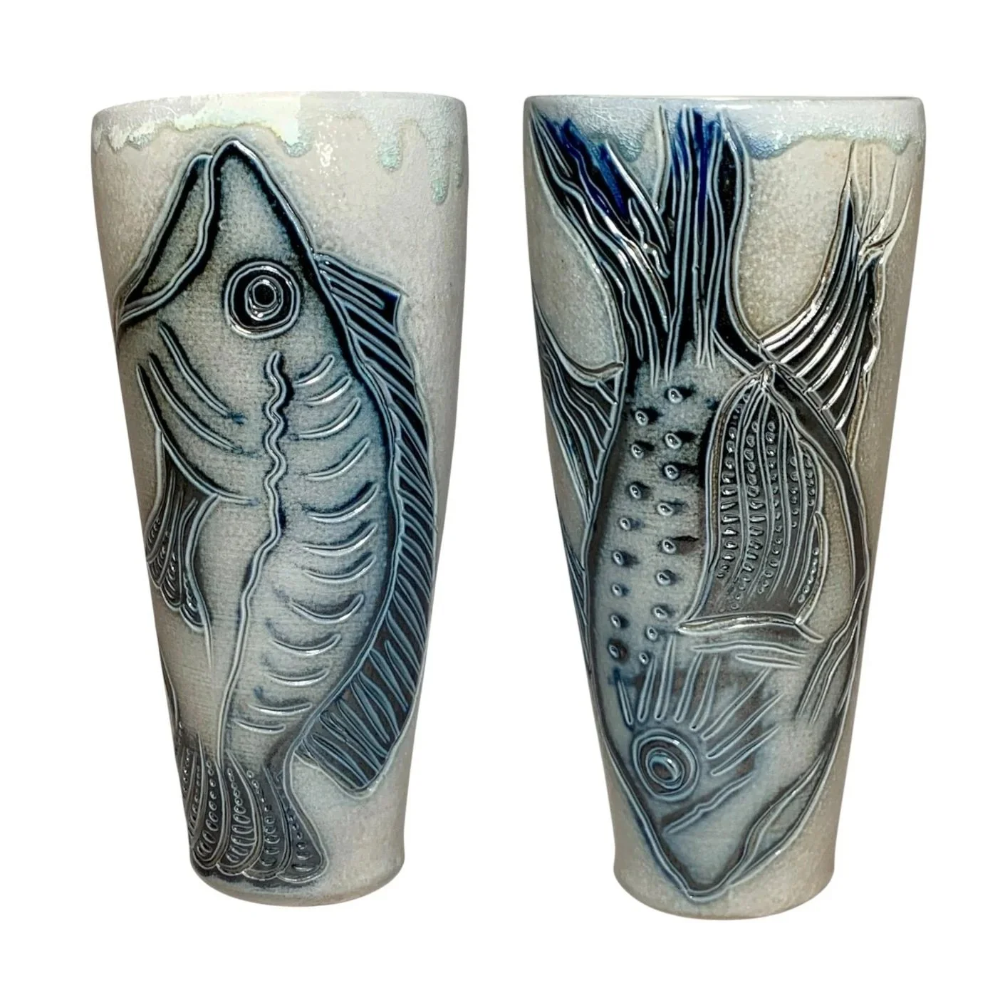 Two ceramic vases with fish and aquatic plant designs in black, white, gray, and blue colors.