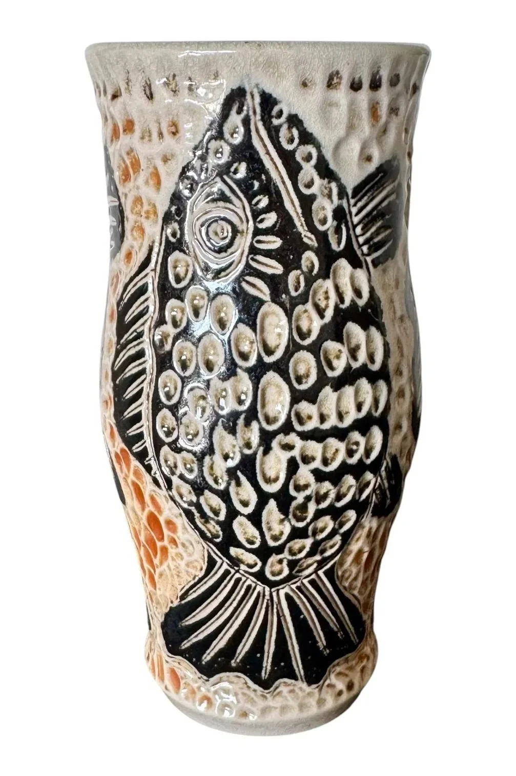 Ceramic vase with black, white, and orange abstract fish design.