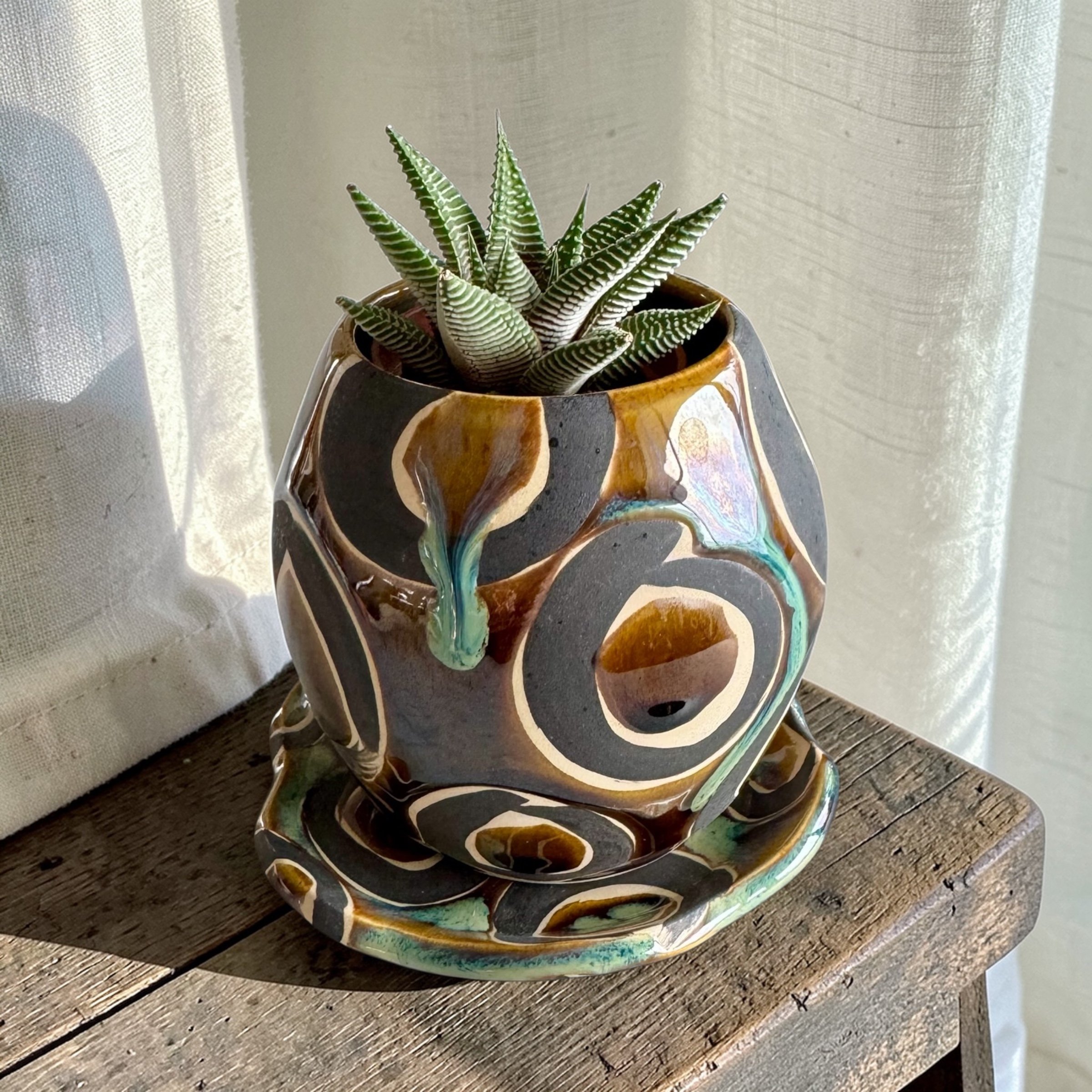 amber and black spiral planter