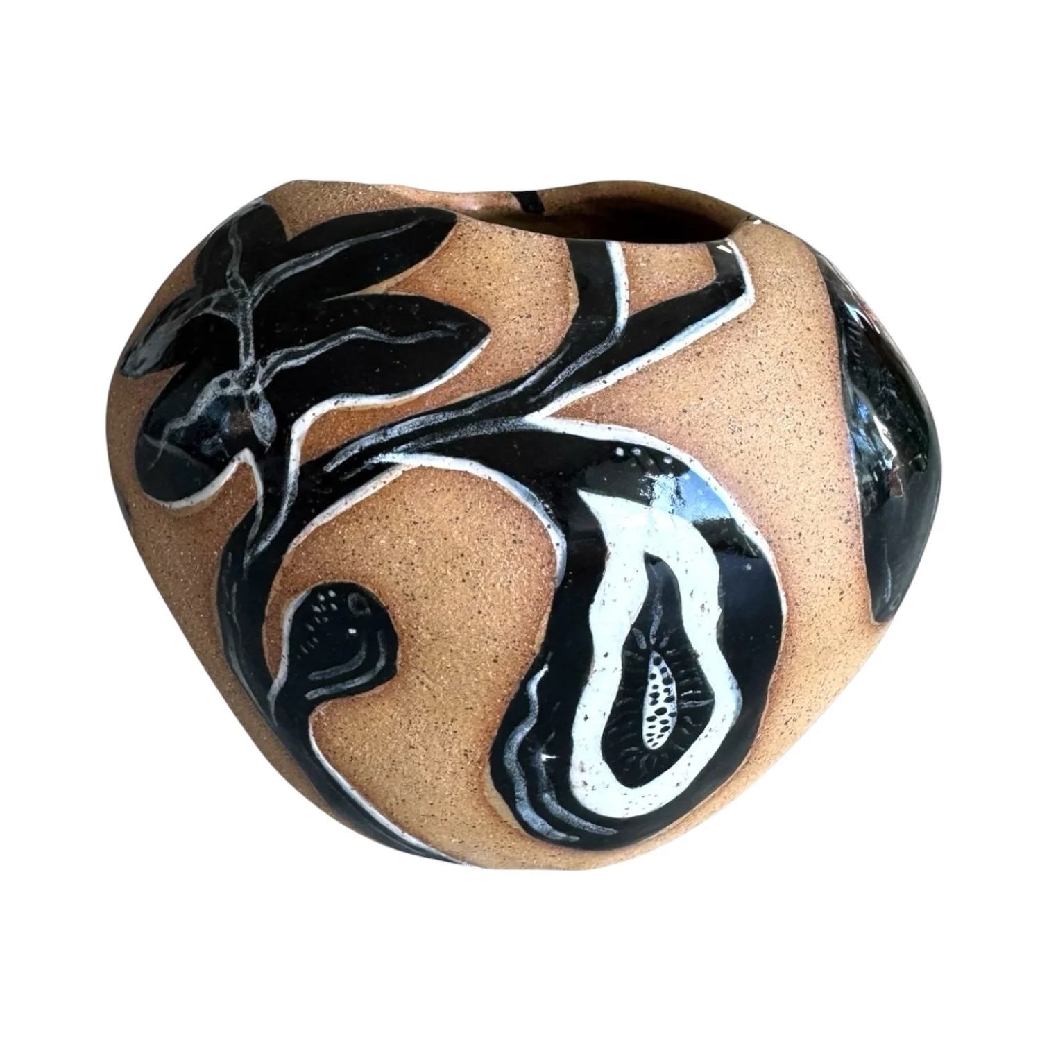 A ceramic vase with a rounded shape, featuring a painted design of black and white abstract floral patterns on a brown, textured background.