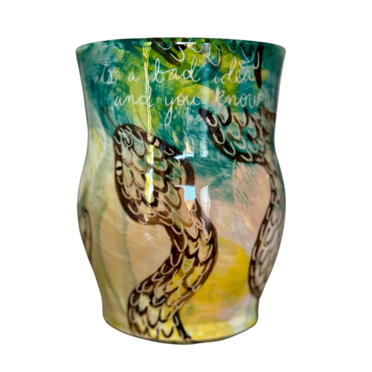 Decorative ceramic vase with painted snake and scripted text design.