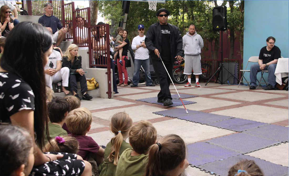 The Butterfly Effect photo of participant navigating the stage using a series of soft mats