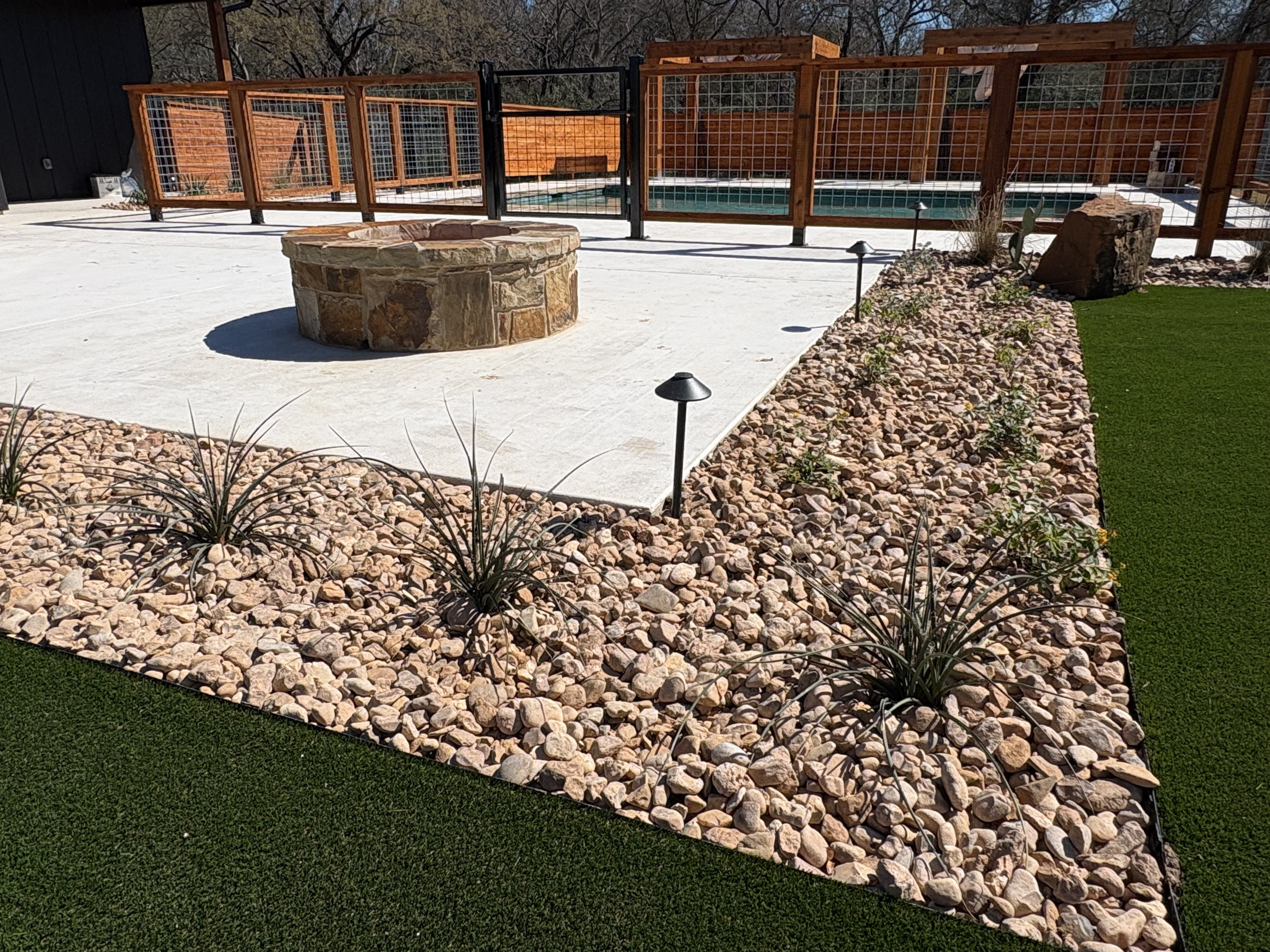 Katz project xerolandscaping, firepit, turf and fence.png
