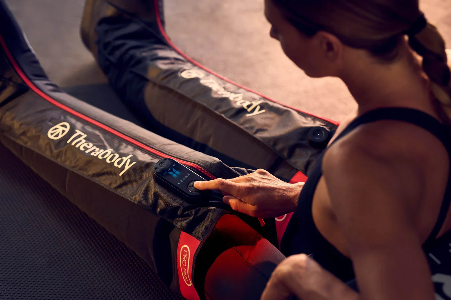 TheraBody compression boots for muscle recovery after training