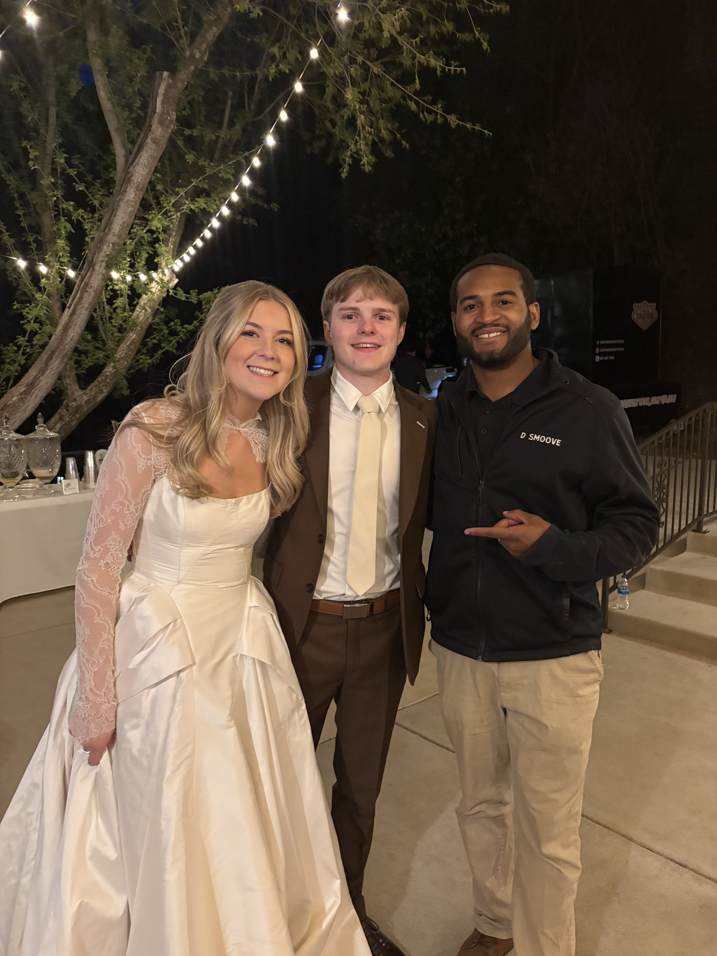 Photo with the Bride and Groom after Djing their wedding!
