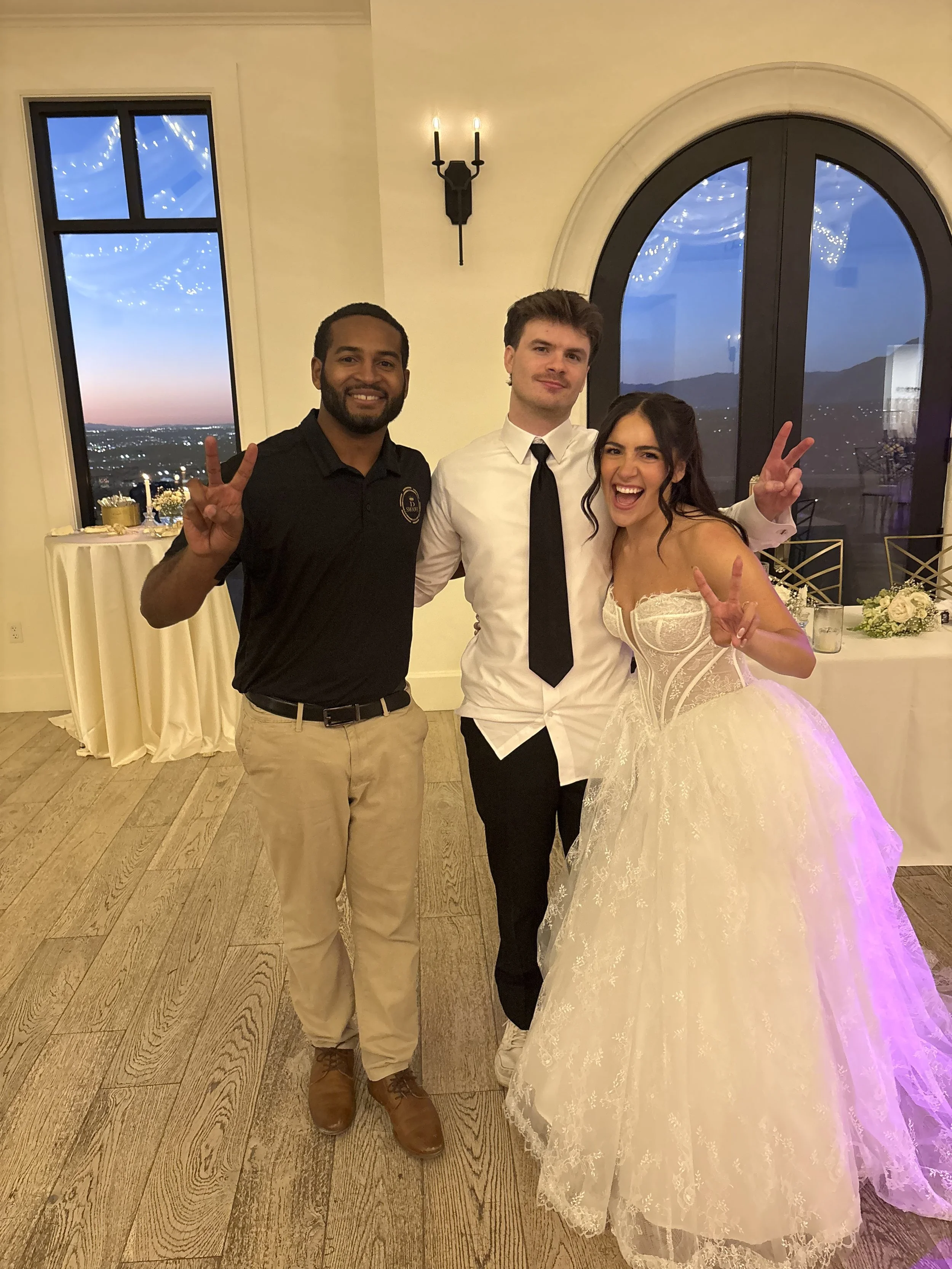 Photo with the Bride and Groom after Djing their wedding!